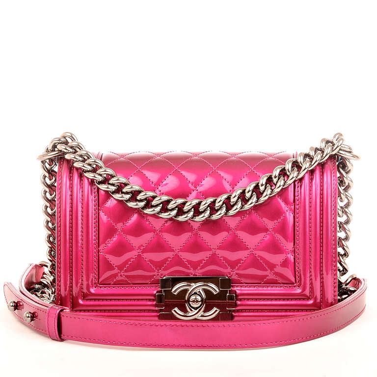 Chanel metallic fuchsia pink quilted patent leather Small Boy Bag with ruthenium hardware, metallic pink lambskin gussets and bottom, front flap with CC push lock closure and ruthenium chain link and pink leather padded shoulder strap. Interior is