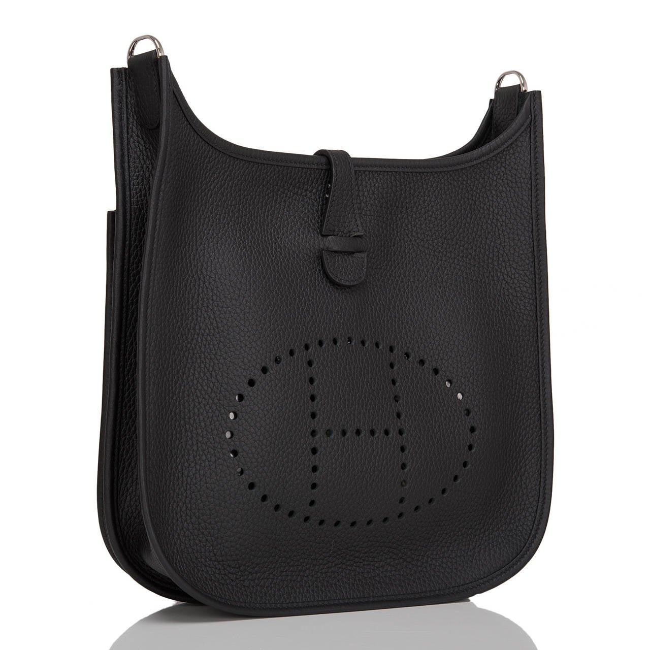 Hermes Black Evelyne III PM in clemence leather with palladium hardware.

This Evelyne III is made in one of the most desired colorways -- black -- in rich clemence leather and has palladium hardware, tonal stitching, large perforated H icon in