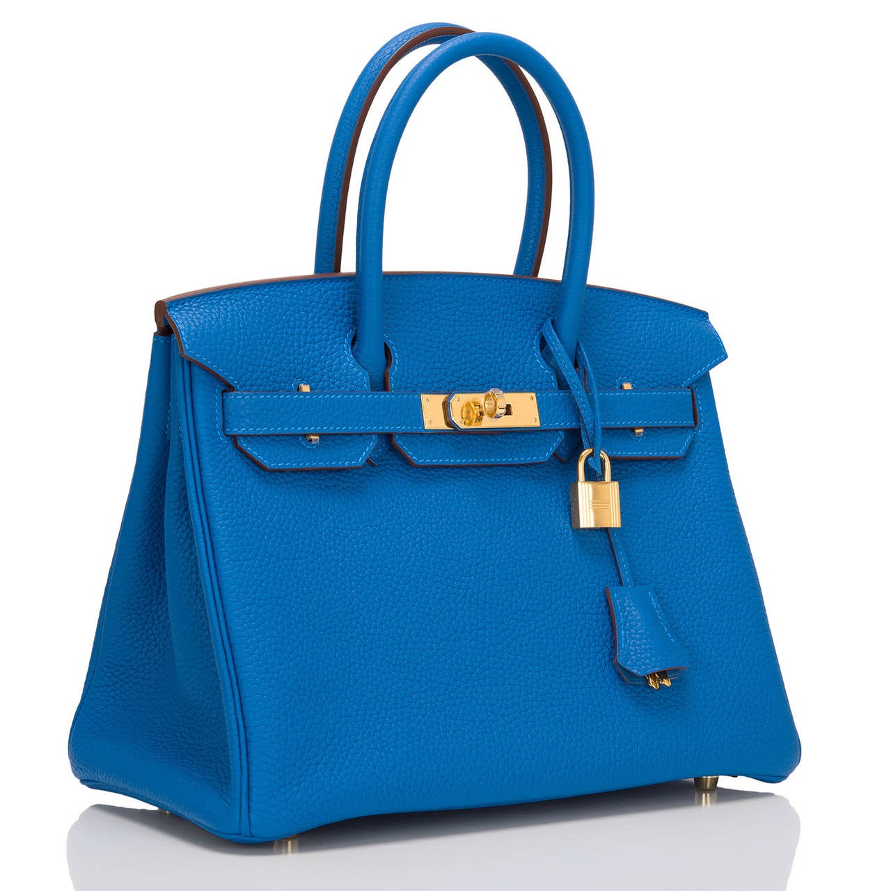 Hermes Mykonos Birkin 30cm in clemence leather with gold hardware.

This Birkin features tonal stitching, front toggle closure, clochette with lock and two keys, and double rolled handles.The interior is lined in Mykonos chevre with one zip pocket