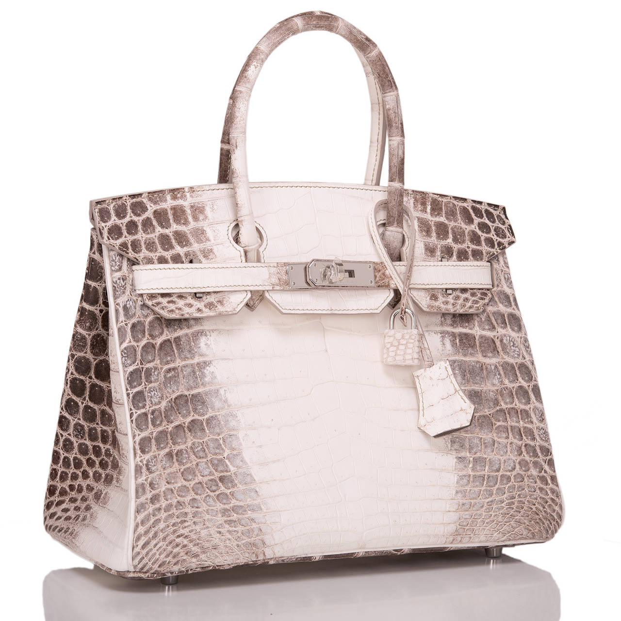 Hermes Himalayan 30cm Birkin in White matte niloticus crocodile skin with palladium hardware.

This rare Himalayan features tonal stitching, front toggle closure, clochette with lock and two keys, and double rolled handles. The interior is lined