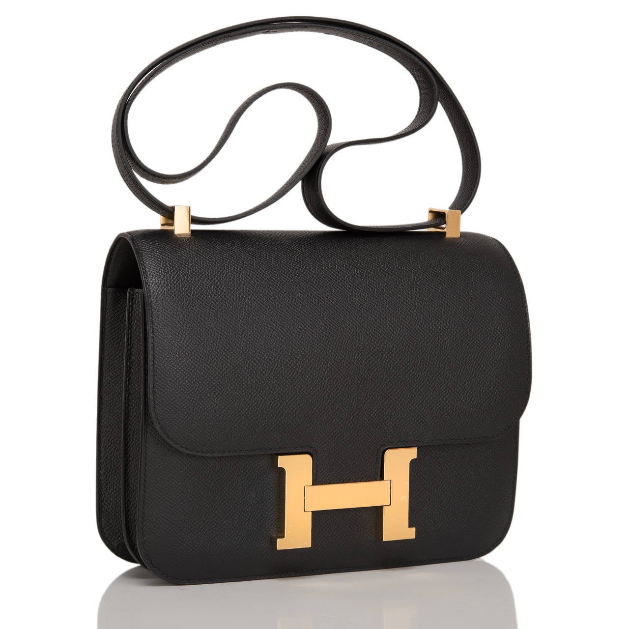 Hermes Black epsom leather Constance 24cm with gold hardware.

This classic Hermes style features tonal stitching, palladium hardware, metal 