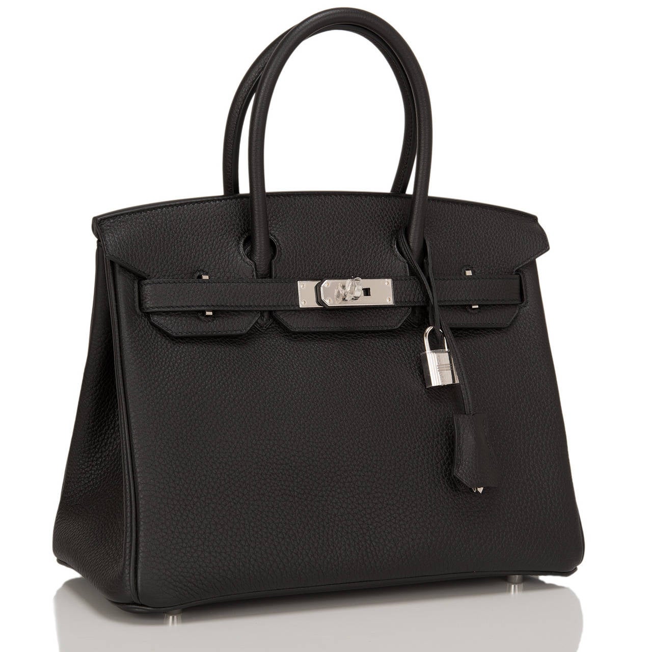 Hermes Black Birkin 30cm in togo (bull) leather with palladium hardware.

This style features tonal stitching, front toggle closure, clochette with lock and two keys, and double rolled handles. The interior is lined in black chevre with one zip