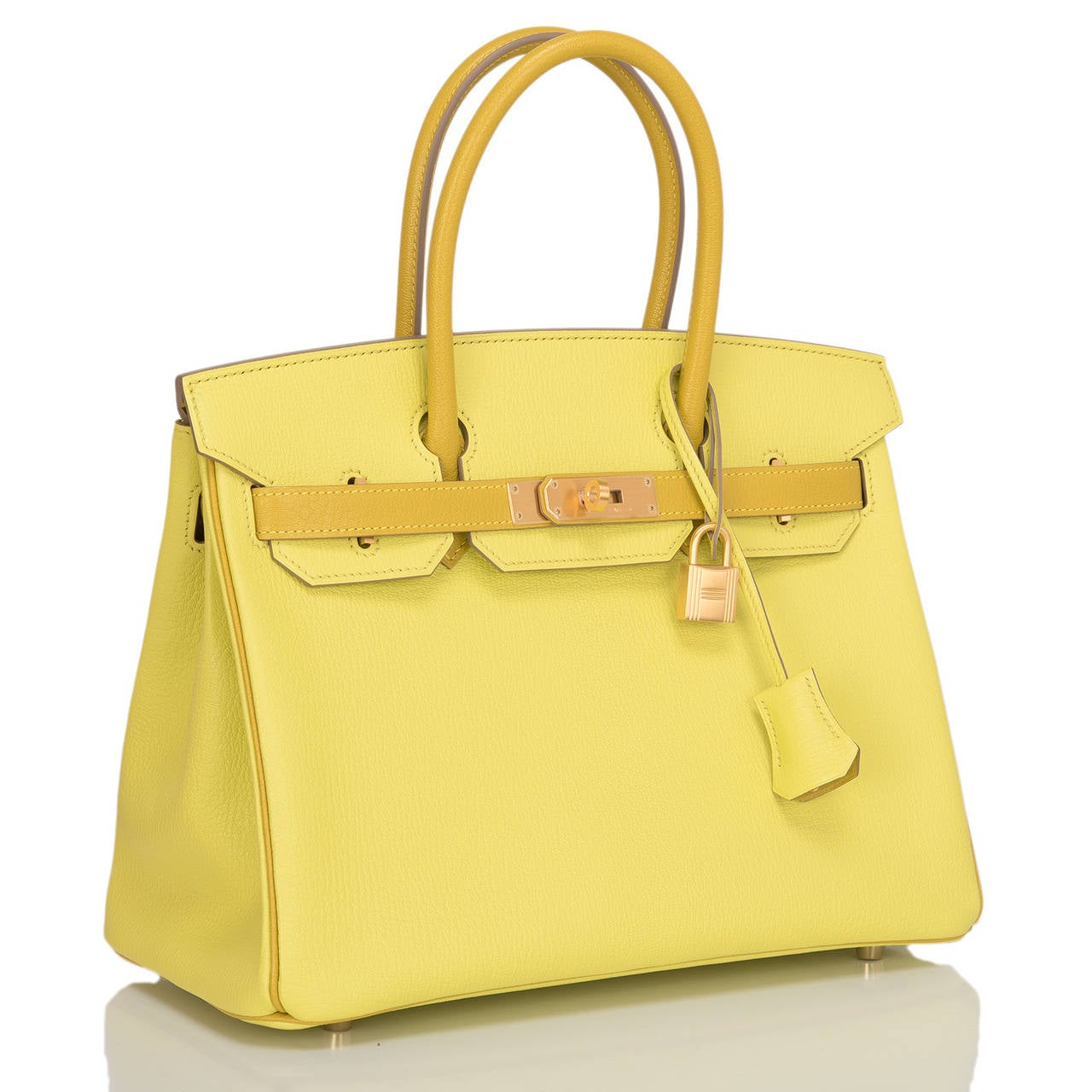 Hermes Bi-color Special Order Horseshoe Soufre in togo leather with brushed gold hardware.

This Special Order Birkin features a front toggle closure, clochette with lock and two keys, and double rolled handles. The interior is lined in Cumin