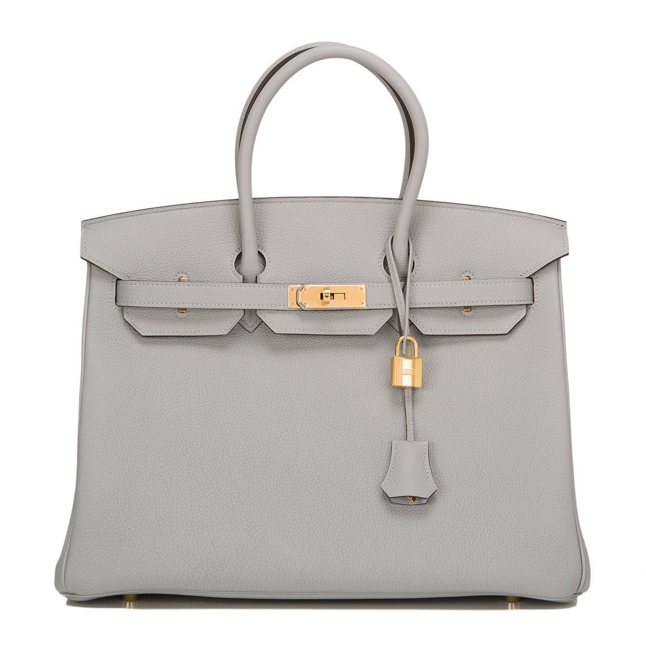 Hermes Blue Glacier Birkin 35cm in togo (bull) leather with gold hardware.

This Birkin features tonal stitching, front toggle closure, clochette with lock and two keys, and double rolled handles. The interior is lined in Blue Glacier chevre with