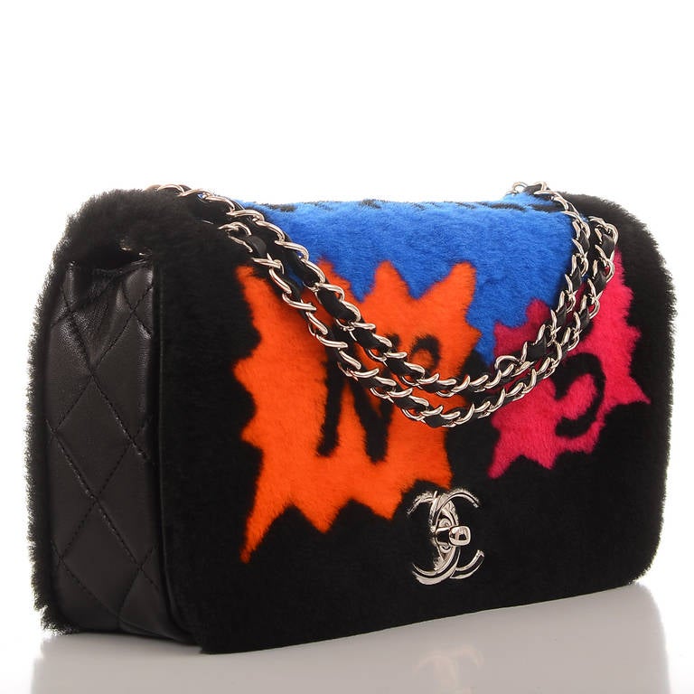 Chanel black shearling flap bag with Chanel comic caption iconography throughout (CHANEL, No5, CC logo) and mutlicolor accents of fuchsia, orange, blue and yellow shearling, with quilted black lambskin leather base and gussets; silvertone hardware,