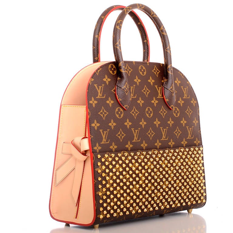 Louis Vuitton Monogram Iconoclasts Shopping Bag designed by Christian Louboutin.

This chic shopper features coated canvas with vachetta leather trim, golden brass hardware, studded front pocket, calf hair back panel in the designer's signature