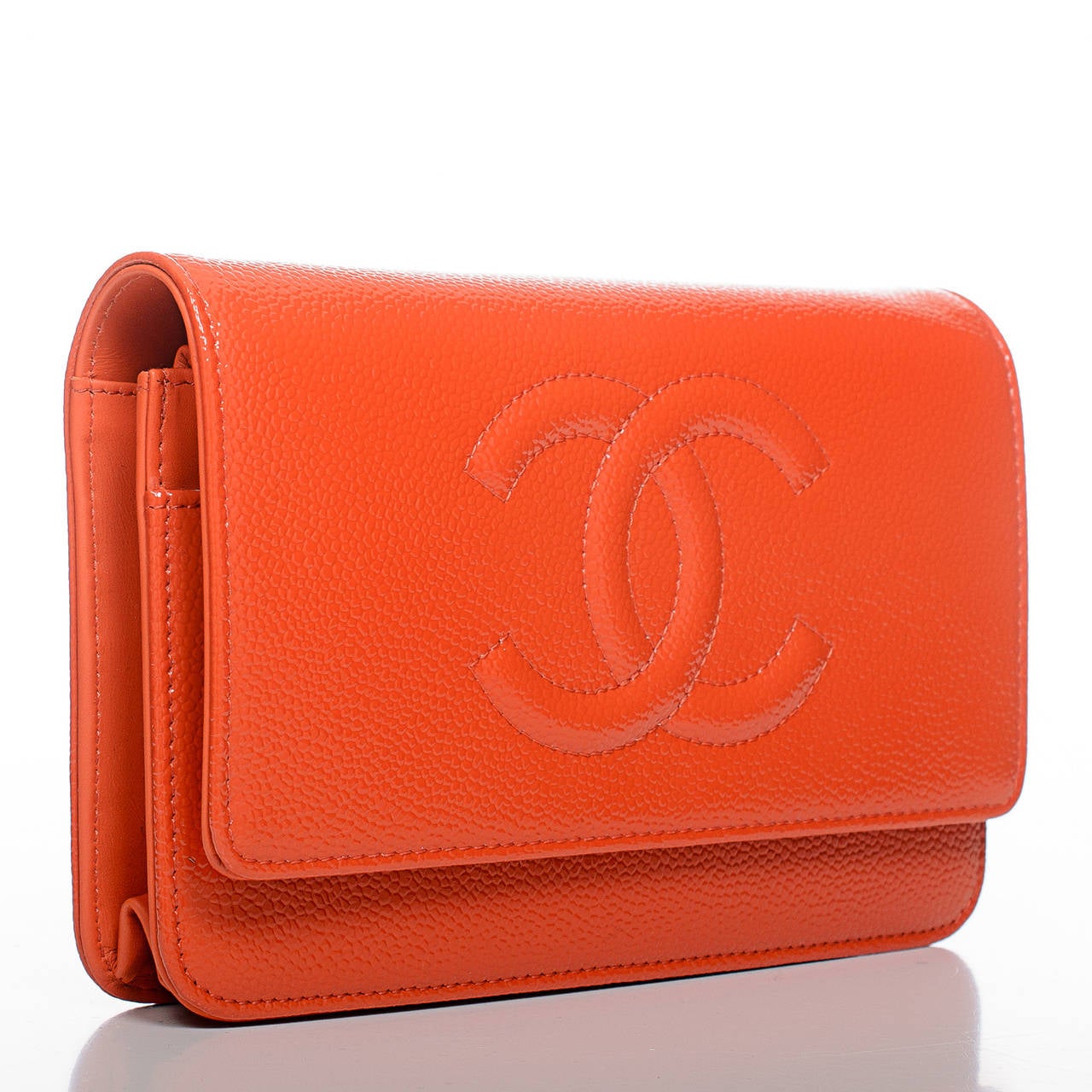 Chanel orange Timeless Wallet On Chain (WOC) of glazed caviar leather with ruthenium hardware

The Wallet On Chain (WOC) is one of the desired Chanel accessory. Its great styling, versatility and attractive price point makes it a must for new and
