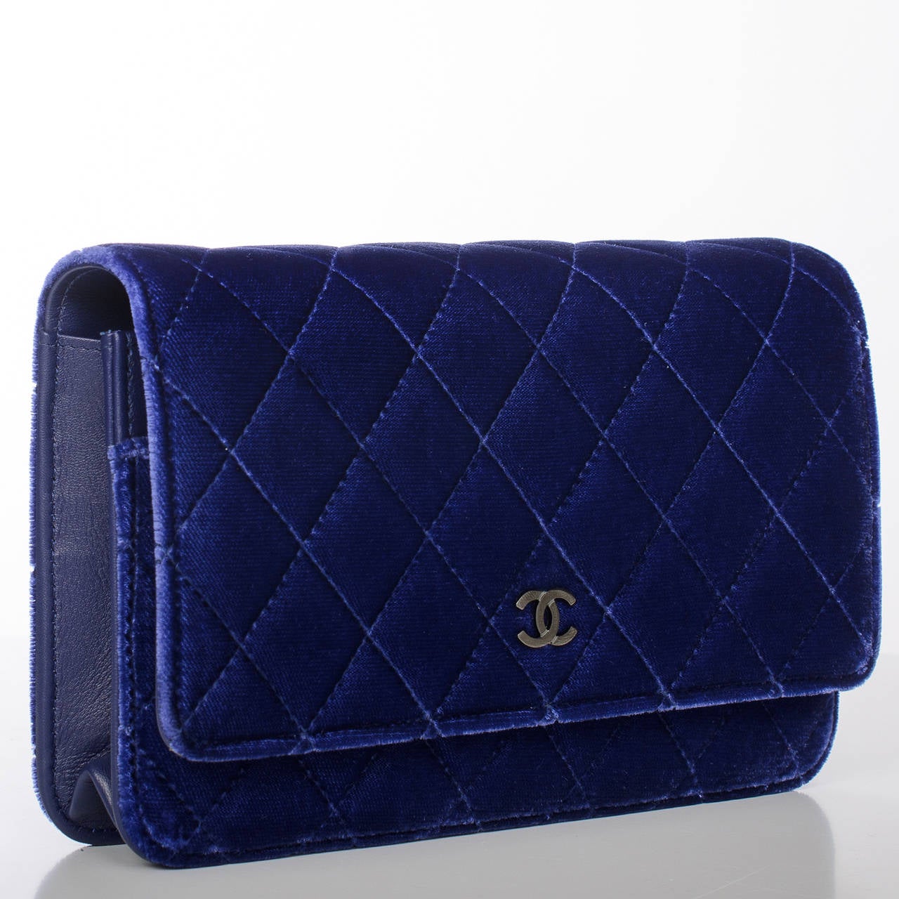Chanel limited edition electric blue Classic Quilted Wallet On Chain (WOC) of velvet (and lambskin leather) with black metal hardware

The Wallet On Chain (WOC) is one of the most desired Chanel accessories. Its great styling, versatility and