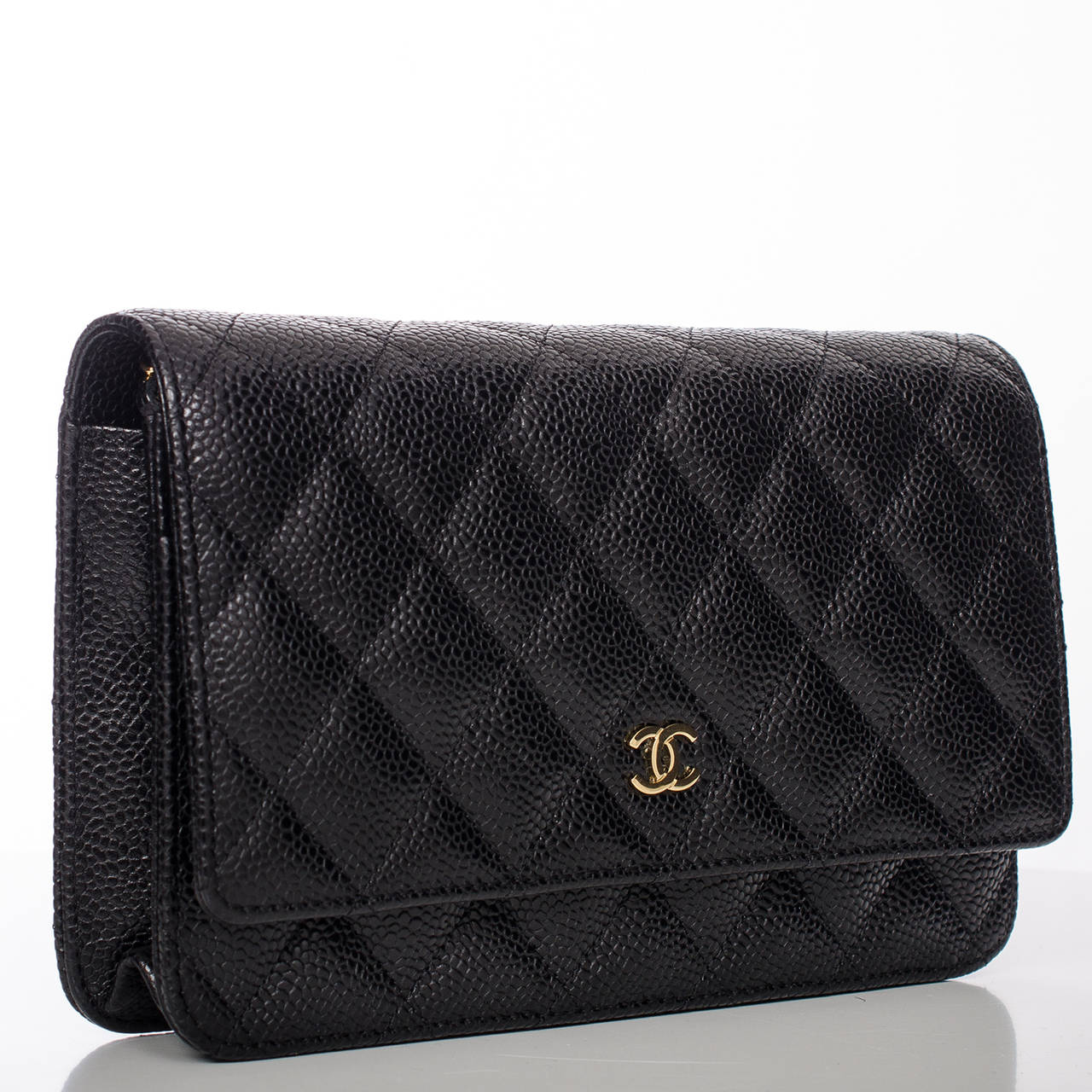 Chanel black Classic Quilted Wallet On Chain (WOC) of quilted caviar with gold tone hardware.

The Wallet On Chain (WOC) is one of the most desired Chanel accessory. Its great styling, versatility and attractive price point makes it a must for new