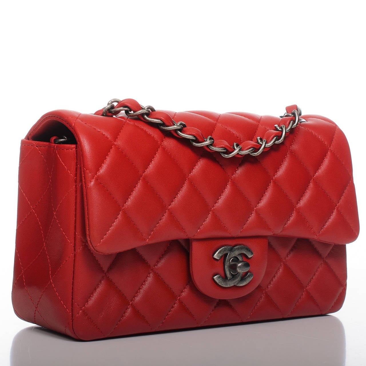 Chanel red Small Classic 2.55 flap bag in quilted lambskin leather with ruthenium hardware.

Named 2.55 to honor the bag's creation in February 1955, the iconic Chanel bag was a modification of the bag Coco Chanel originally designed in 1929.