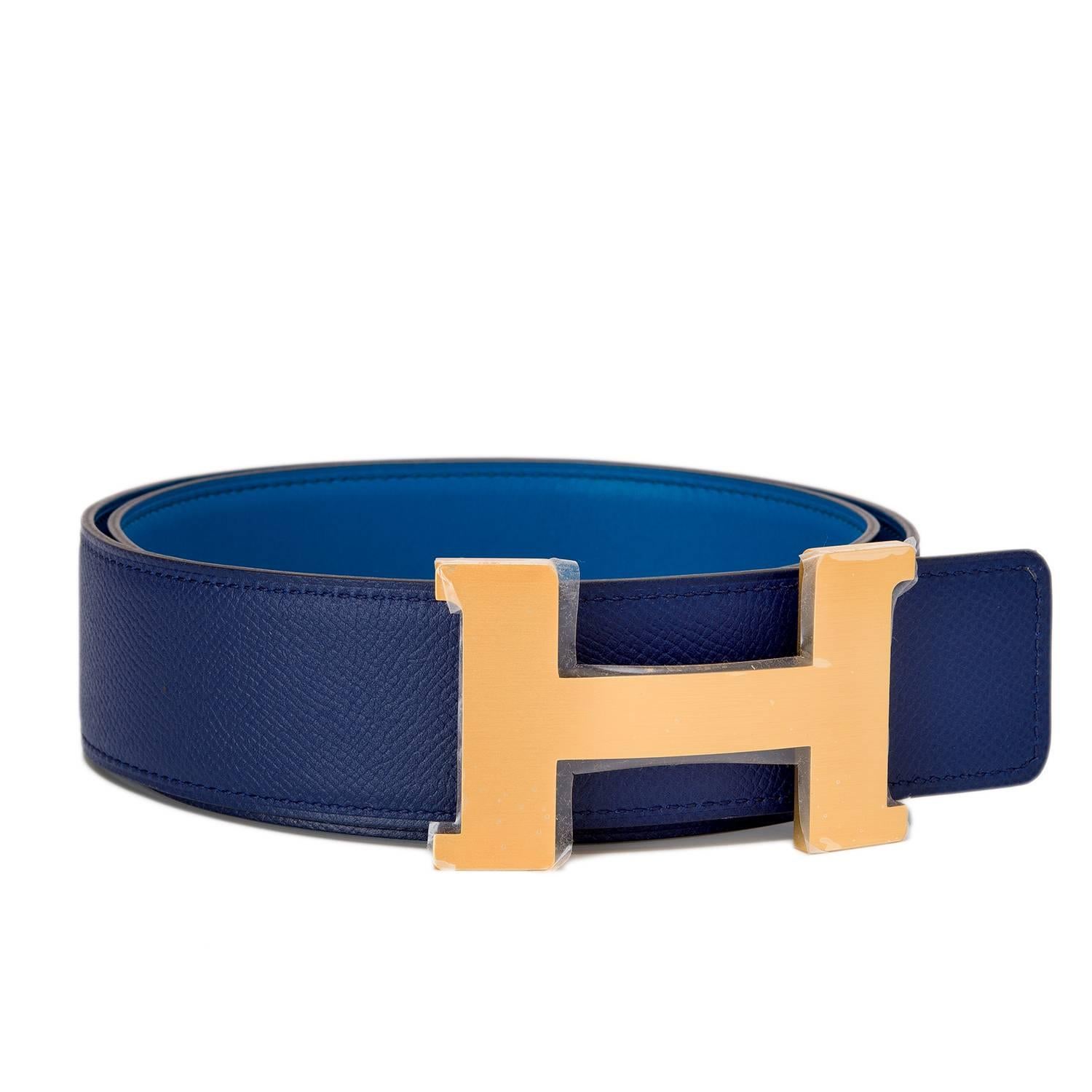  	
Hermes belt kit comprising an adjustable wide 42mm Constance H belt of blue izmir swift leather with tonal stitching reversing to blue sapphire epsom leather with tonal stitching accompanied by a removable brushed gold H buckle.

Origin:
