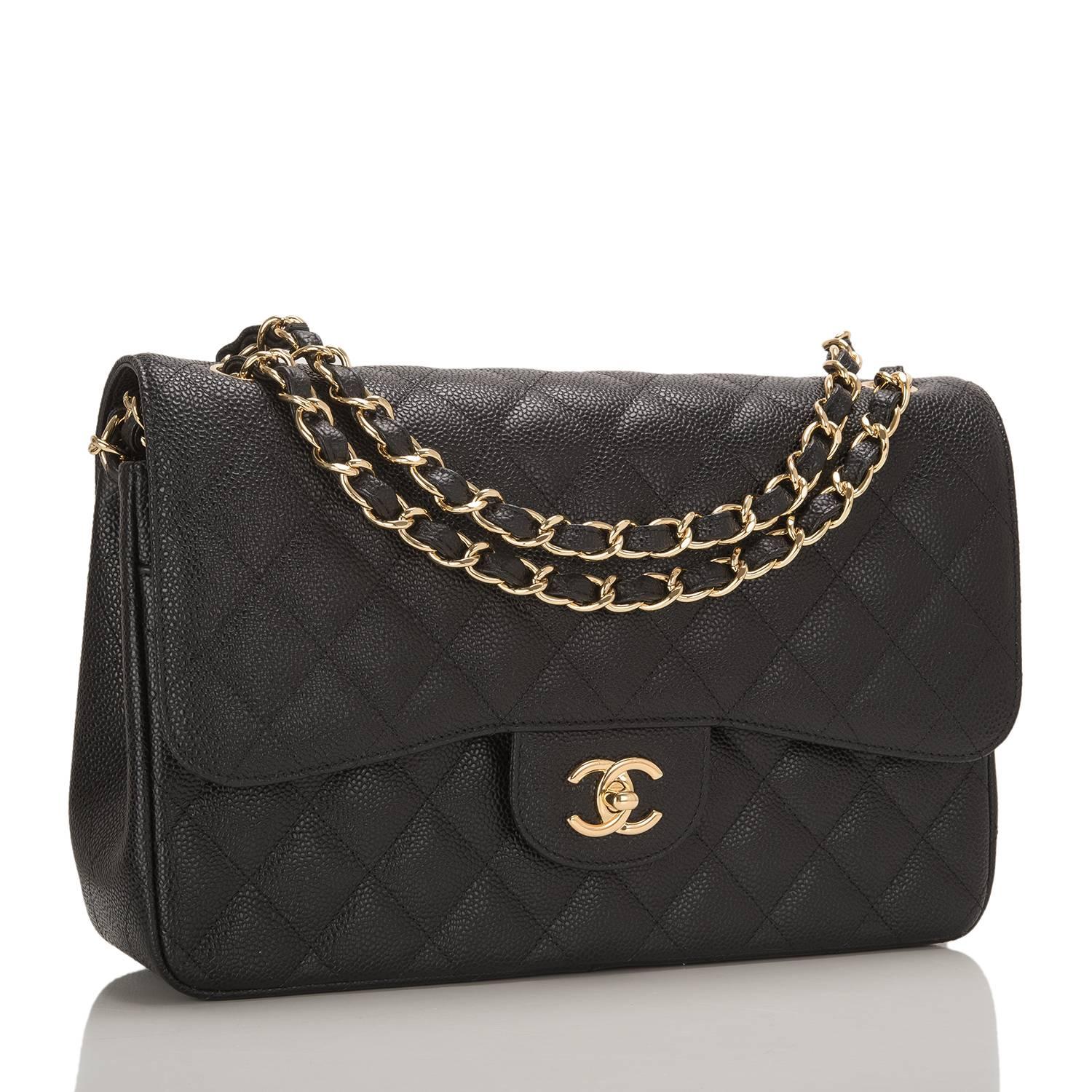 Chanel Jumbo Classic double flap bag of black caviar leather with gold hardware.

This bag features a front flap with signature CC turnlock closure, a half moon back pocket, and an adjustable interwoven gold tone chain link with black leather