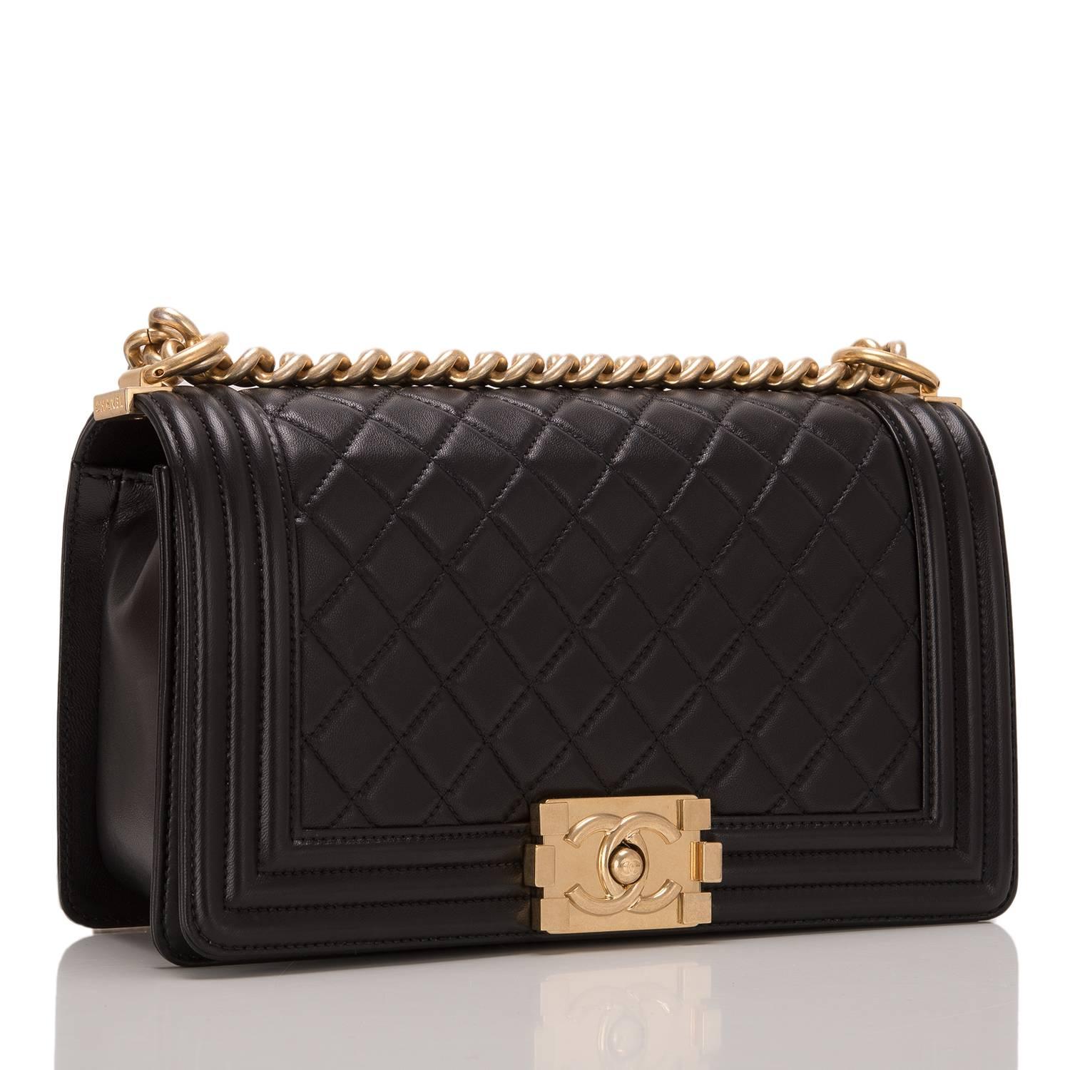  	
Chanel black quilted calfskin Medium Boy Bag with antique gold hardware.

This bag features a full front flap with Le Boy Chanel signature CC push lock closure and antique gold chain link and black leather padded shoulder/crossbody