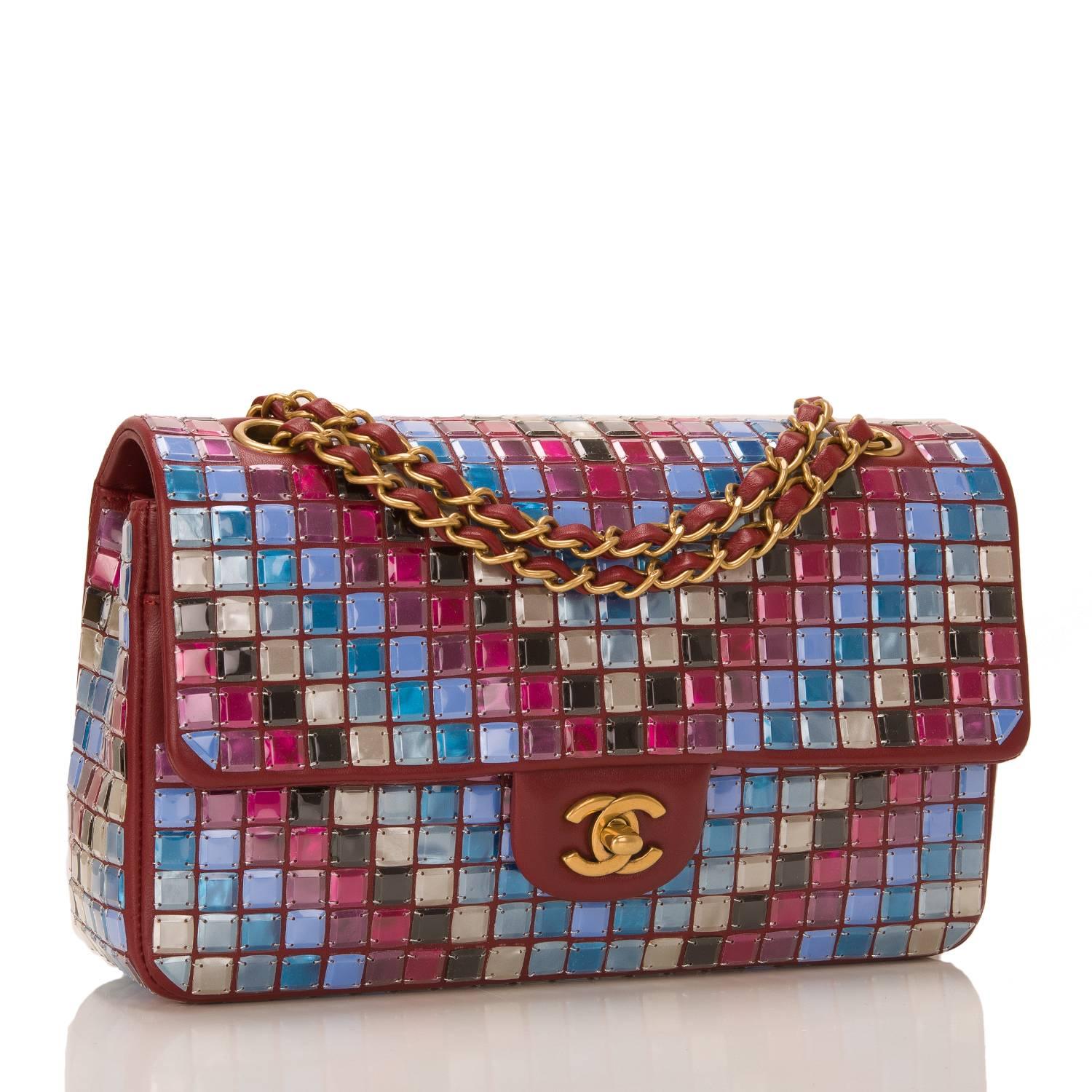 Chanel runway Red Multicolor Lambskin Medium Flap Bag with Mosaic Embroideries by Lesage with gold tone hardware

The bag features allover mosaic embellishments of reds, pinks, blues, white, and black inn a diagonal pattern on red lambskin leather