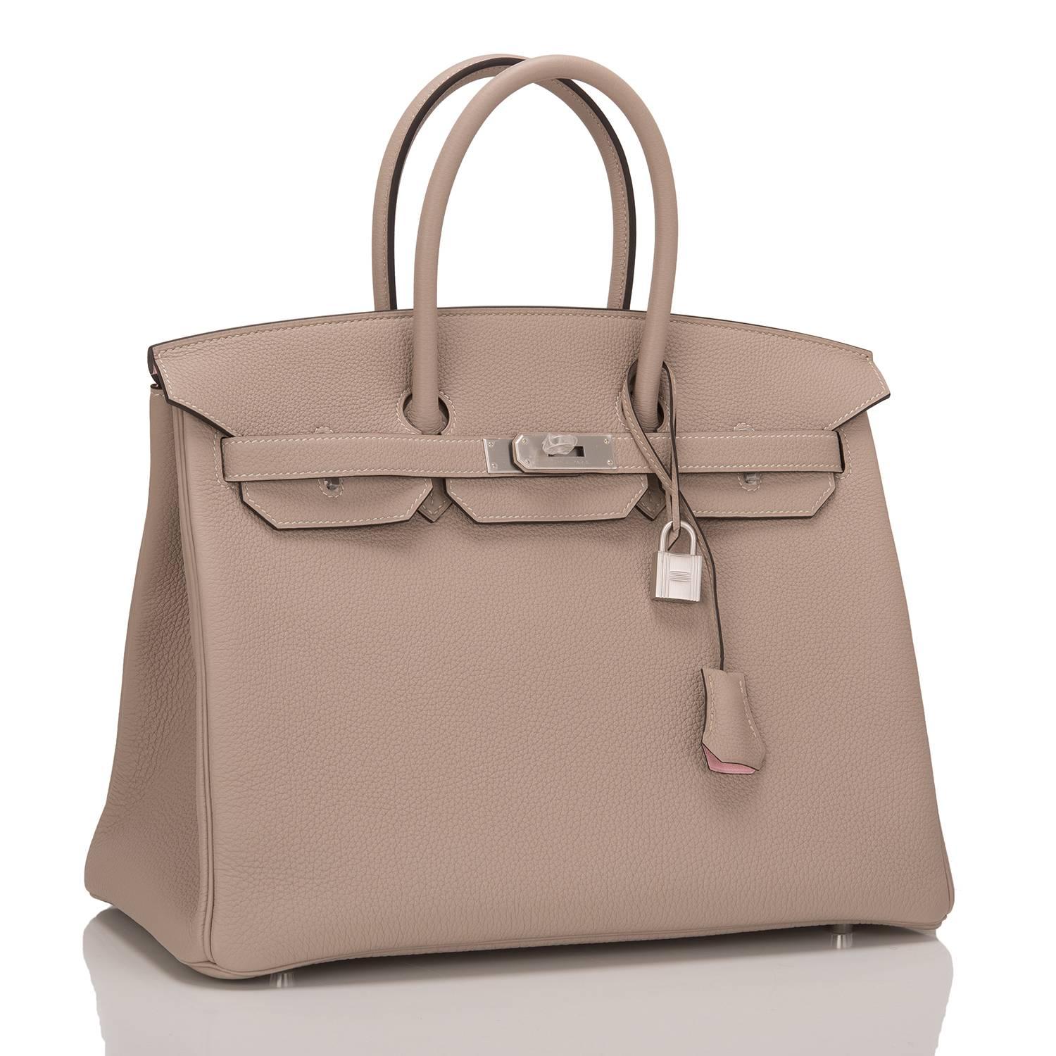 Hermes Special Order Horseshoe Stamped Gris Tourterelle 35cm in togo (bull) leather with brushed silver hardware.

This Birkin features tonal stitching, front toggle closure, clochette with lock and two keys, and double rolled handles.

The