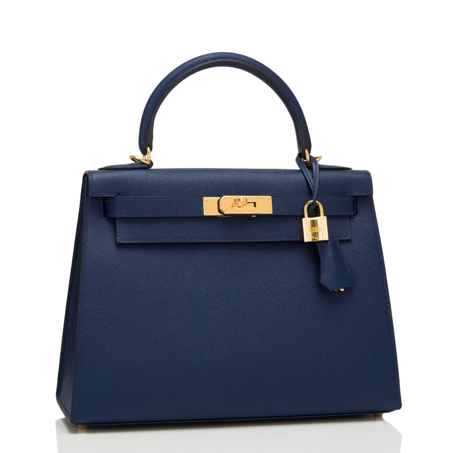 Hermes Blue Sapphire (Bleu Saphir)  Sellier Kelly 28cm of epsom leather with gold hardware.

This Kelly Sellier has tonal stitching, a front toggle closure, a clochette with lock and two keys, a single rolled handle and an optional shoulder
