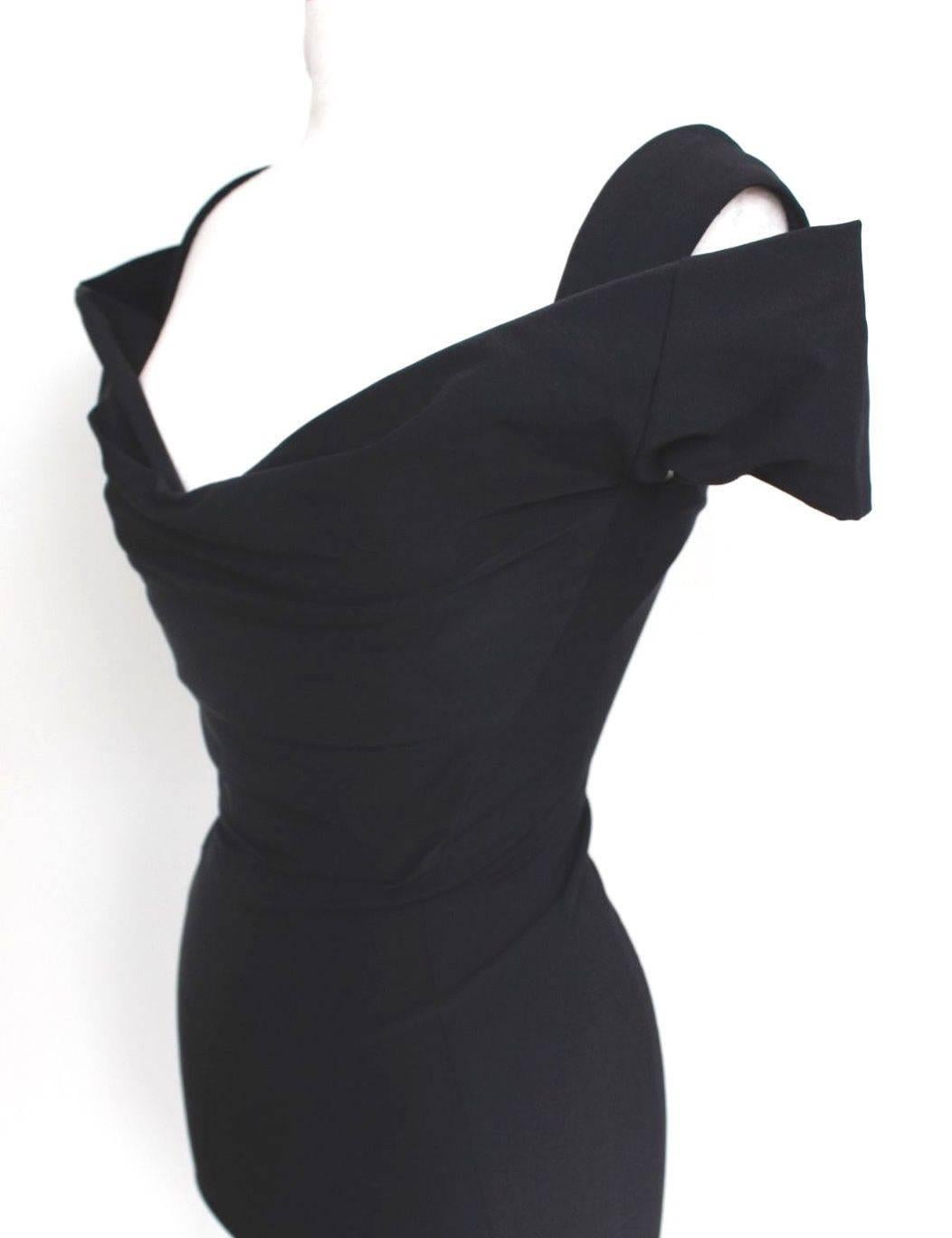 Vivienne Westwood Gold Label Black Corset Dress uk 10 
Classic Westwood corset dress featuring off the shoulder style
Concealed zip fastening along back. 
80% tectal, 20%elastine 
Length 38 inches, chest 17 inches, waist 11 inches, chest 16