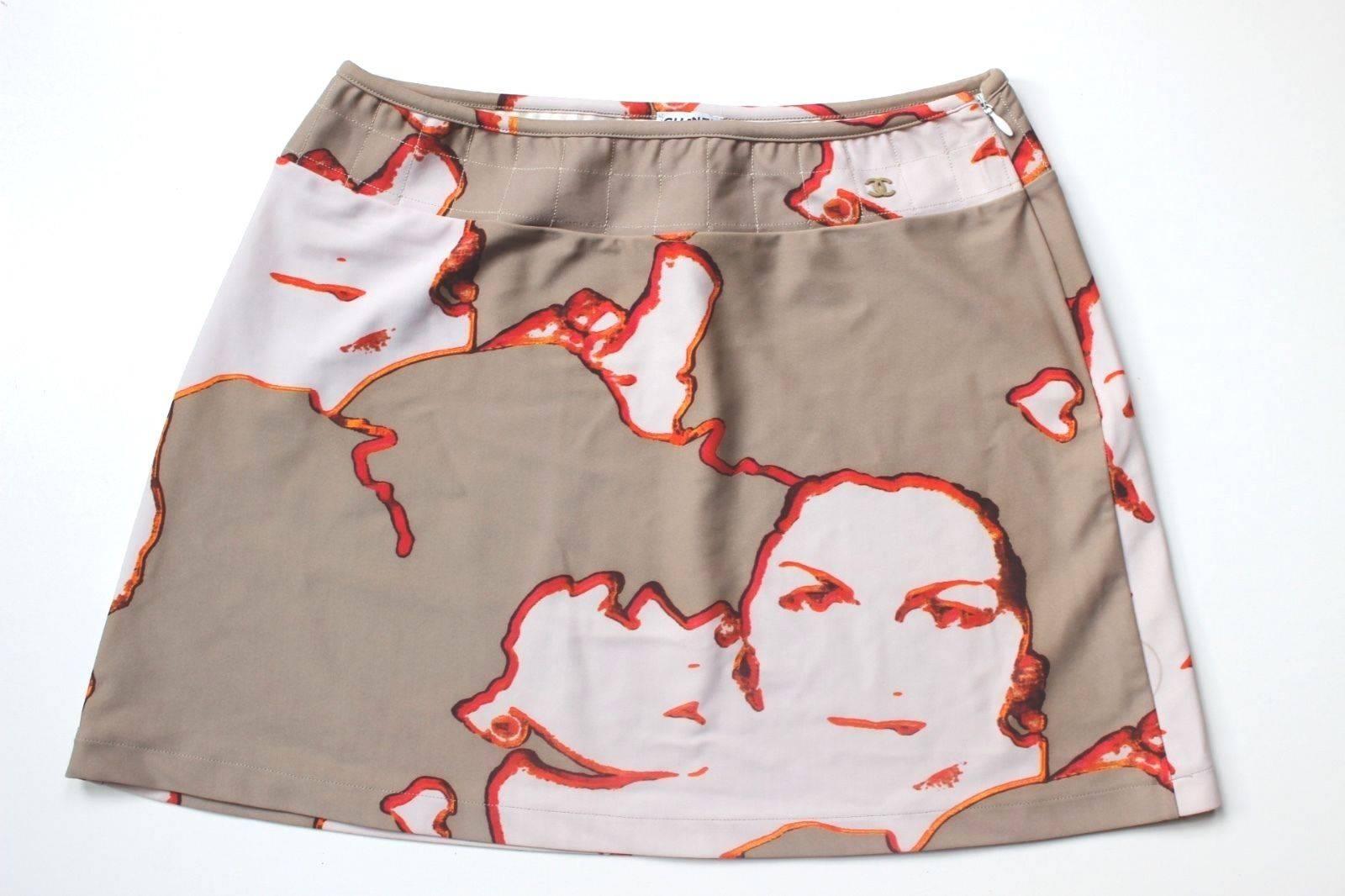 Coco Chanel Gabrielle Face Print Quilted Skirt 38 uk 10 
Amazing printed skirt with quilted trim 
Made from swim-ware fabric, can be worn in or out the pool 
Excellent condition 
Full length 14 inches, waist 13.5 inches across, hips 19 inches across