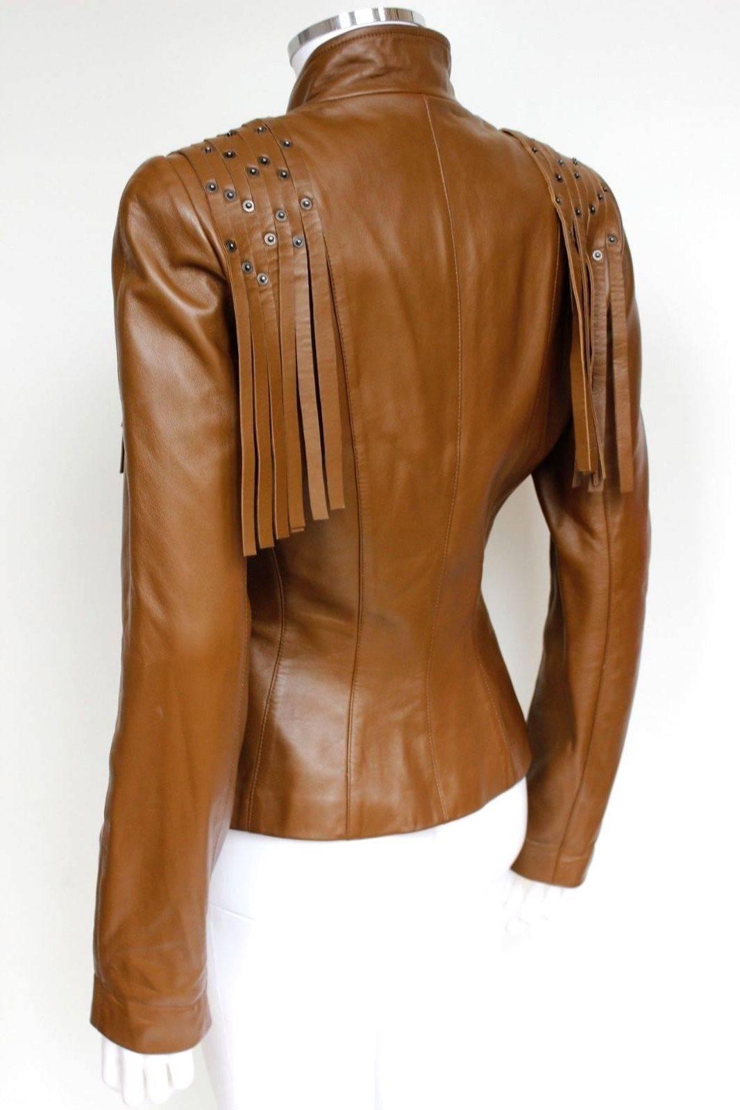 Mugler Tan Leather Fringe Jacket F38 UK 10 
Western style Jacket from Mugler featuring leather fringe with brass studs 
Zip fastening, fully lined 
Length 22 inches, sleeve 25 inches long. chest 17 inches across , waist 14 inches across laid