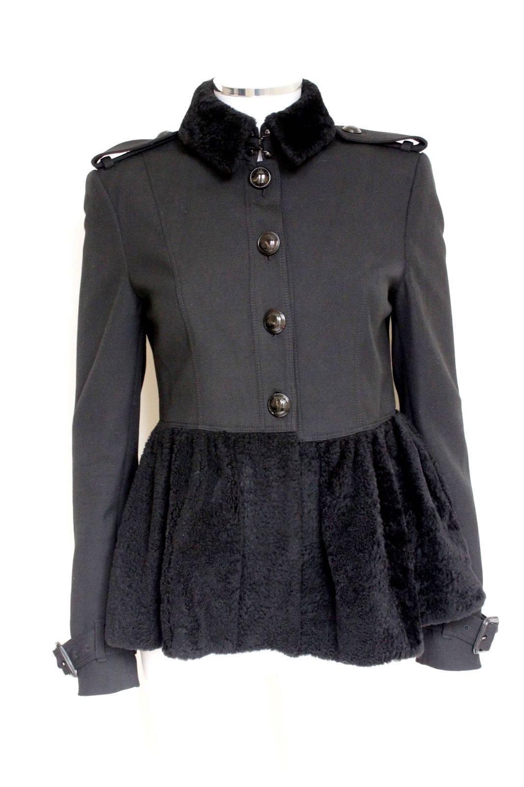 Burberry London Black Shearling fur Military Jacket UK 10-8 

100% shearling peplum panel and collar. Military epaulettes to the shoulder 

Length 24 inches, sleeve 25 inches, chest 18.5 inches, waist 16.5 inches across laid flat

Size uk 10, comes