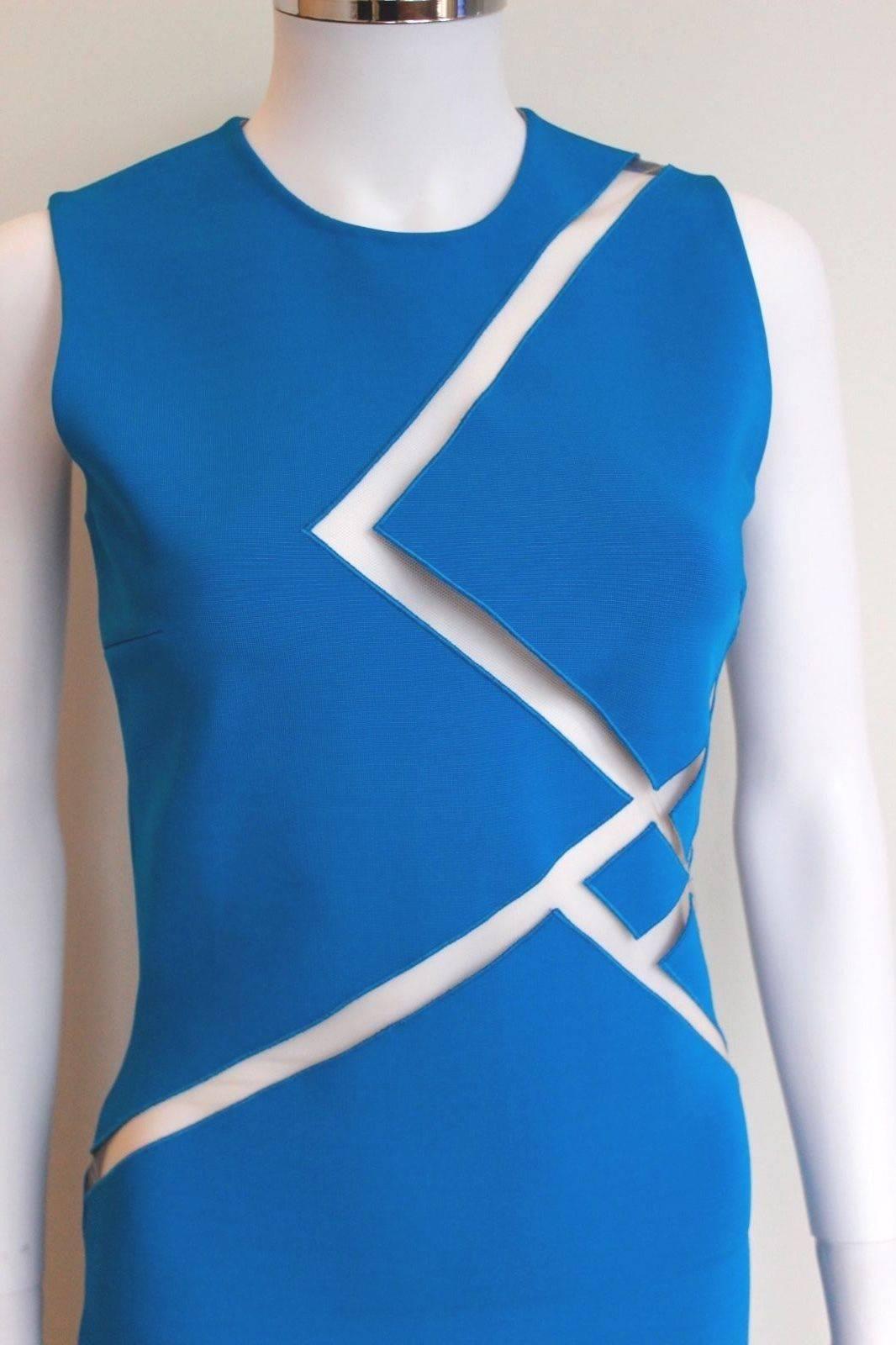 New David Koma Blue Mesh Insert Cut Out Dress uk 10 
Statement blue dress from David Koma featuring diagonal mesh cut out to the bodice  
length 44 inches, chest 16 inches, waist 13 inches across, hips 16.5 inches across laid flat 
86%Viscose, 10%