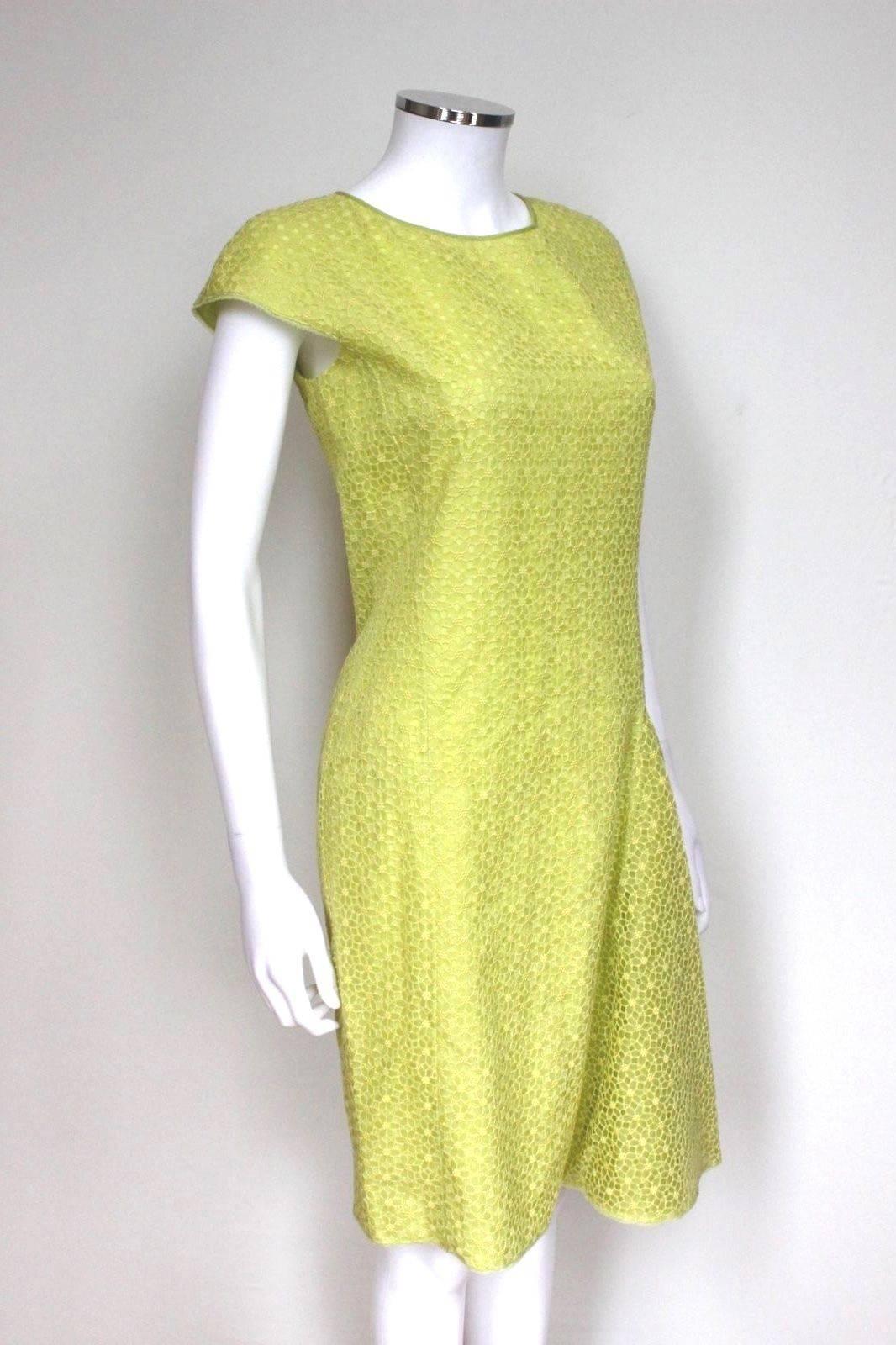 New Giambattista Valli Lime Lace Dress IT 40 UK 8
Bold and flirty lace dress, perfect for this summer 
Cap sleeve lace dress with crew neckline, flare hem to one side 
Concealed back zip closure.
Fully lined 
64%cotton 29% Silk 7% polyester
Length