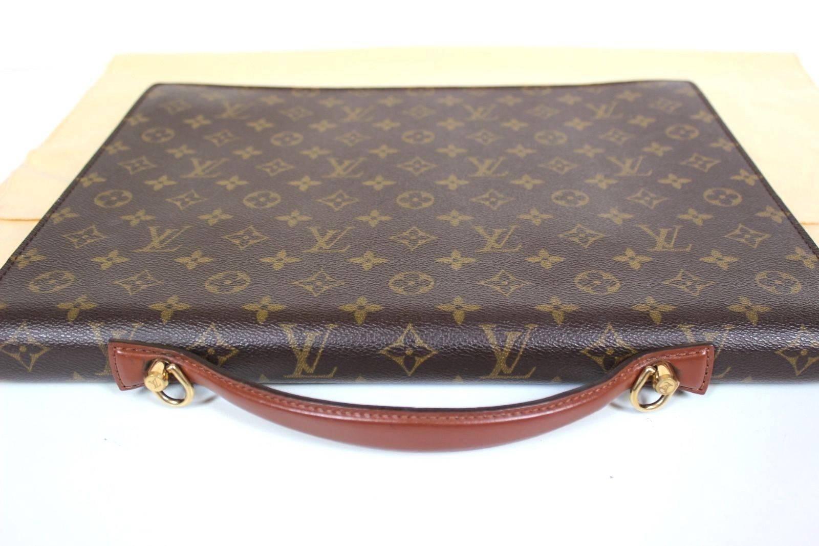 100% Authentic Louis Vuitton Monogram Monceau Briefcase Brown Satchel 
This briefcase from Louis Vuitton in very Good condition, a front flap closure, a monogram print, a flat top handle, and a zip fastened interior compartment. 
Comes with