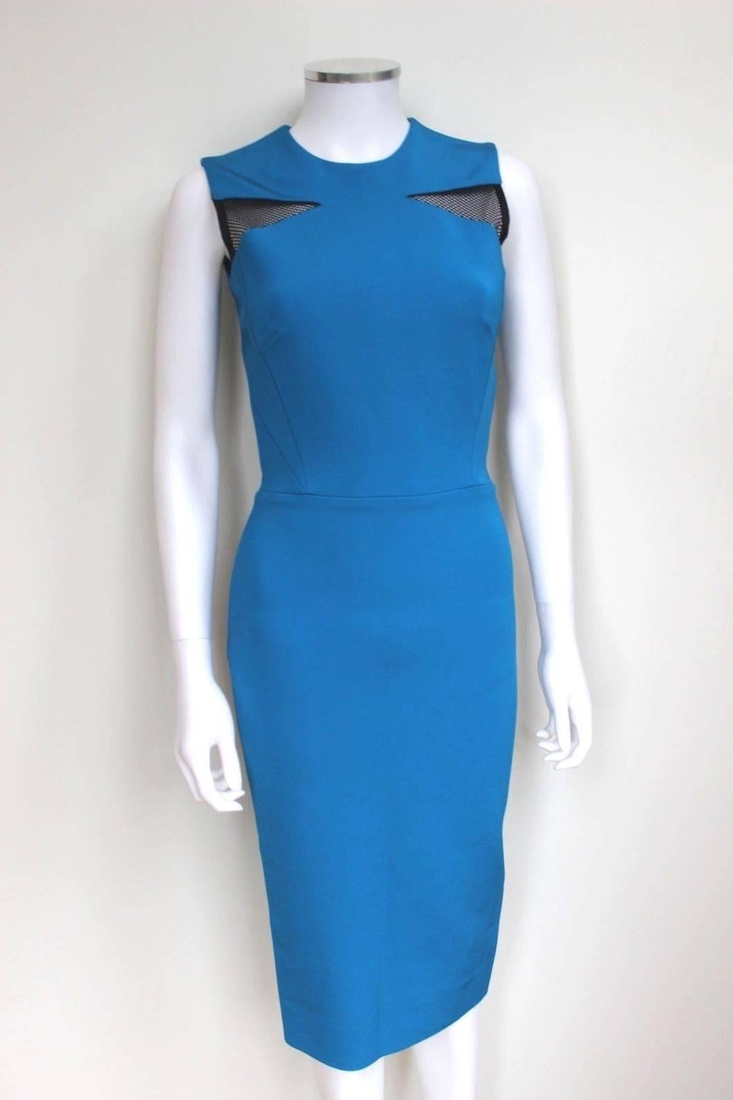 Victoria Beckham Blue Black Mesh-trimmed Ponte Dress UK 8
Black mesh panels, exposed zipper, partial lining. Two-way zip fastening through back. 
86% viscose, 10% polyester, 4% elastane; 
lining: 100% silk; trim: 77% polyester, 23% elastane.