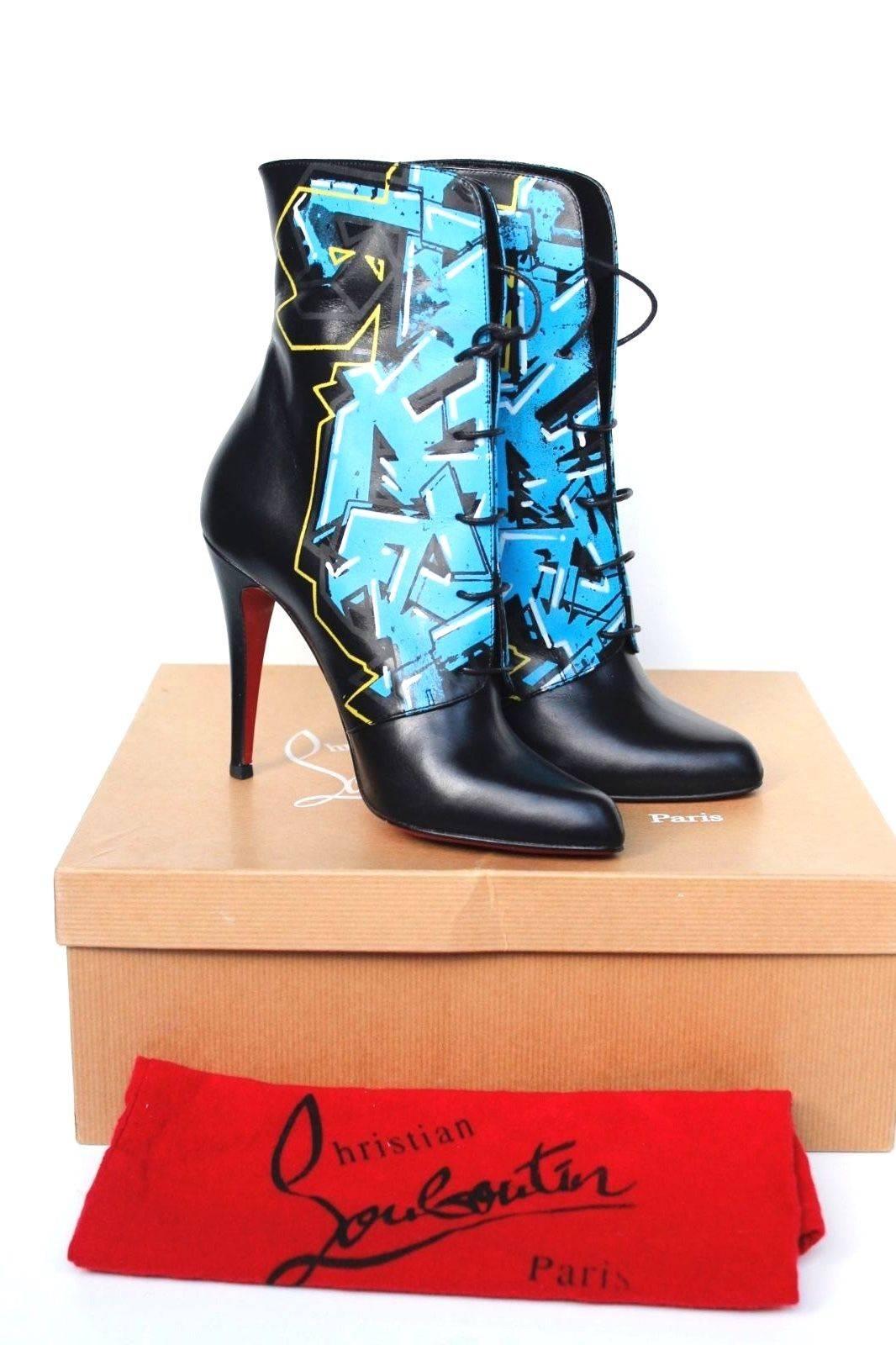 CHRISTIAN LOUBOUTIN Madison Graffiti Black Leather Boots 38 uk 5 

This is a rare pair from Christian Louboutin's Limited Edition Graffiti Collection 
Show stopping style, with blue graffiti
Front lace fastening with 4.5 inch heels 
From Louboutin,