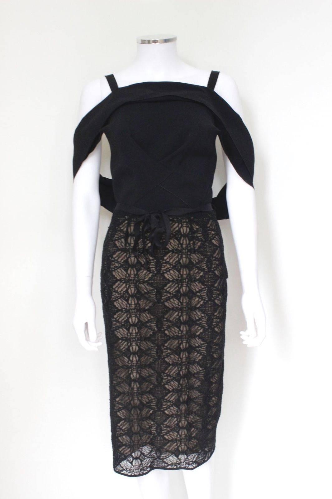 £1550 Roland Mouret Avalon Lace 3 Way Dress UK 10 
Cotton-blend and embroidered lace dress from Roland Mouret's resort 2013 collection
Can be worn 3 ways, with the arms under or over the cape style shoulders 
Cowl neckline leads into a V-back with