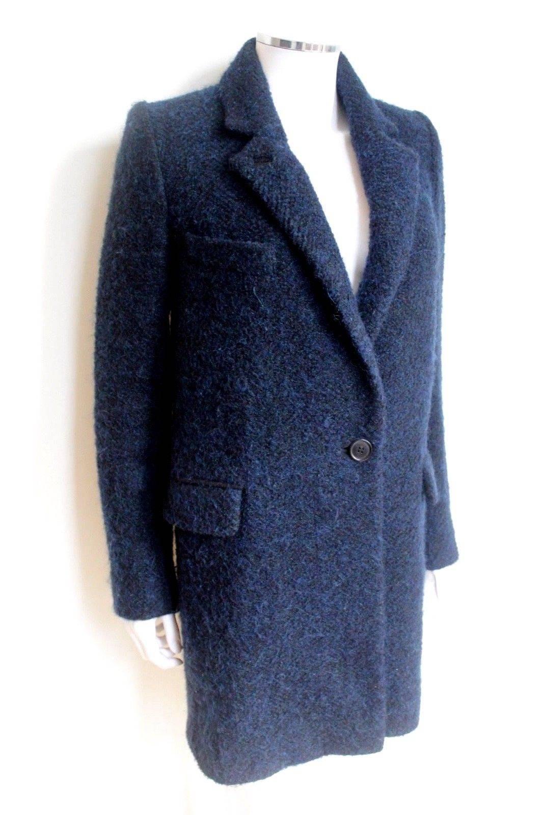 New Isabel Marant Etoile Daphne Navy Wool-Blend Coat F 34 uk 6
Navy wool, mohair, alpaca and cotton blend 'Daphne' coat from Isabel Marant Étoile featuring notched lapels, long sleeves, a chest pocket, a front button fastening, a herringbone pattern