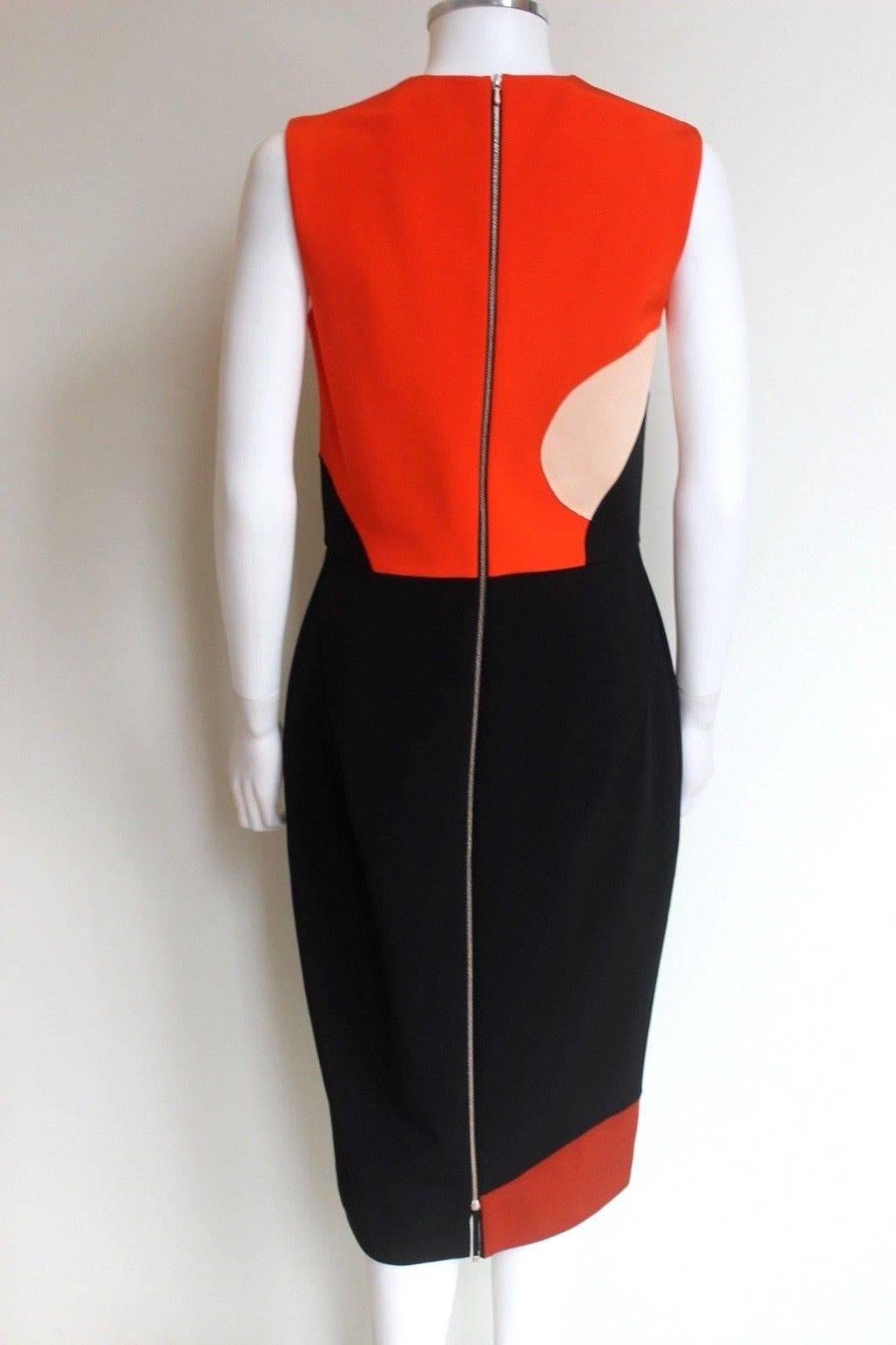 New Victoria Beckham Sleeveless Heart Colorblock Sheath Dress, Sunset UK 12-14
Victoria Beckham dense-ribbed knit dress with heart-shaped colorblock effect.
Jewel neckline.
Sleeveless; full shoulder coverage.
Fitted silhouette.
Straight