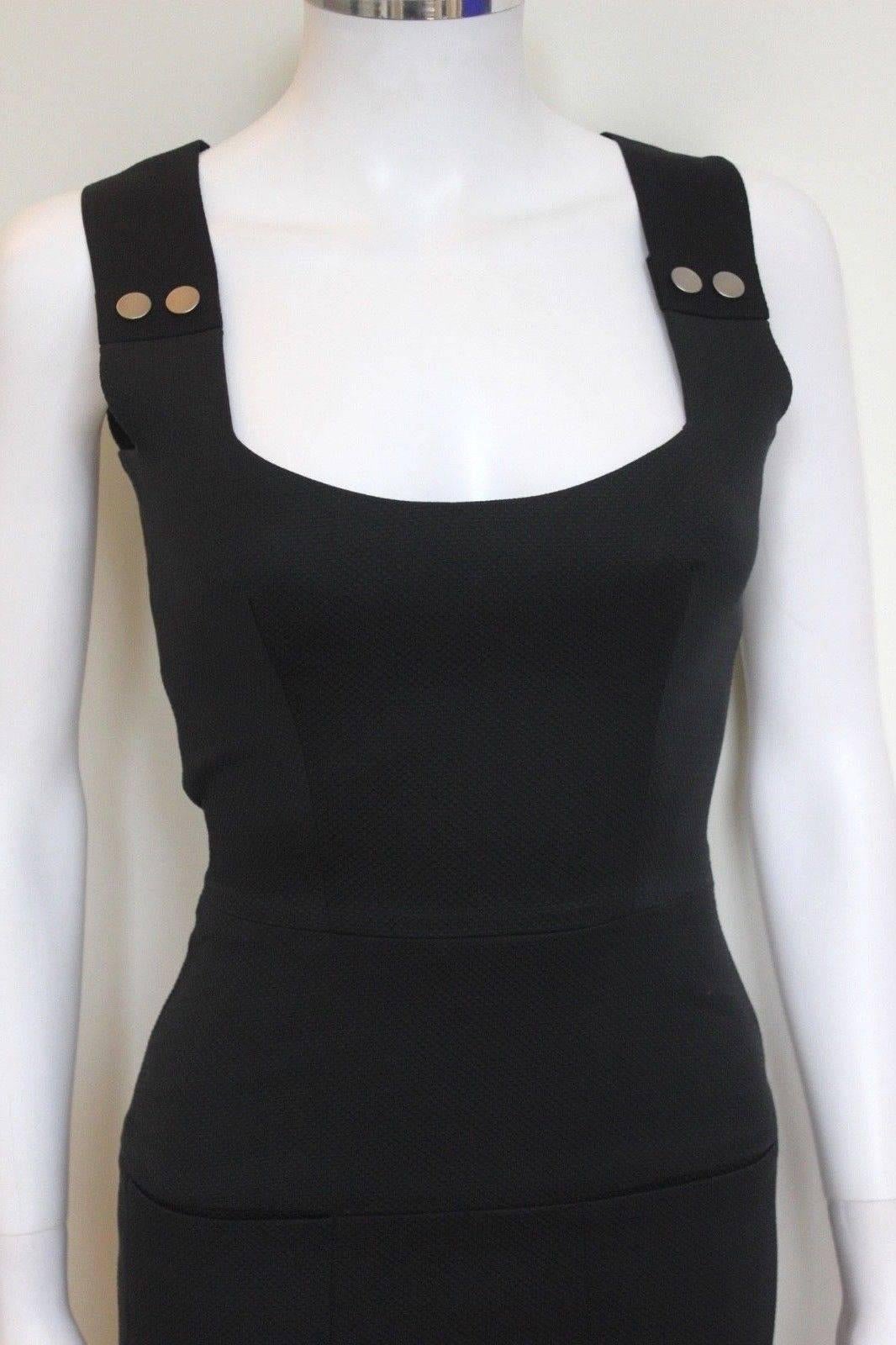 VICTORIA BECKHAM Basket Weave Black Dress uk 8 
Figger hugging dress with textured fabric 
Silver studs to the shoulder straps 
Slim pocket tot the hip area as ass in the 7th photo, the small mark above the pocket is just dust :)
Exposed zip to the