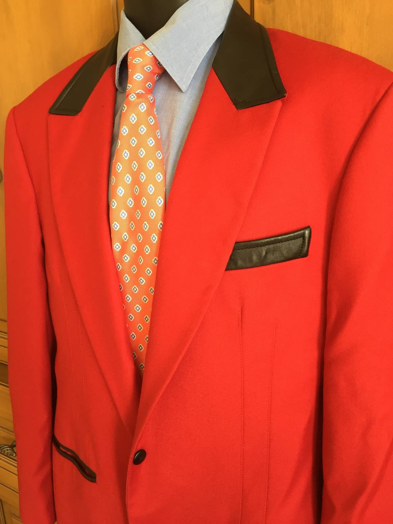Tomato red jacket with leather trim, circa 1982 , from Claude Montana, Paris
