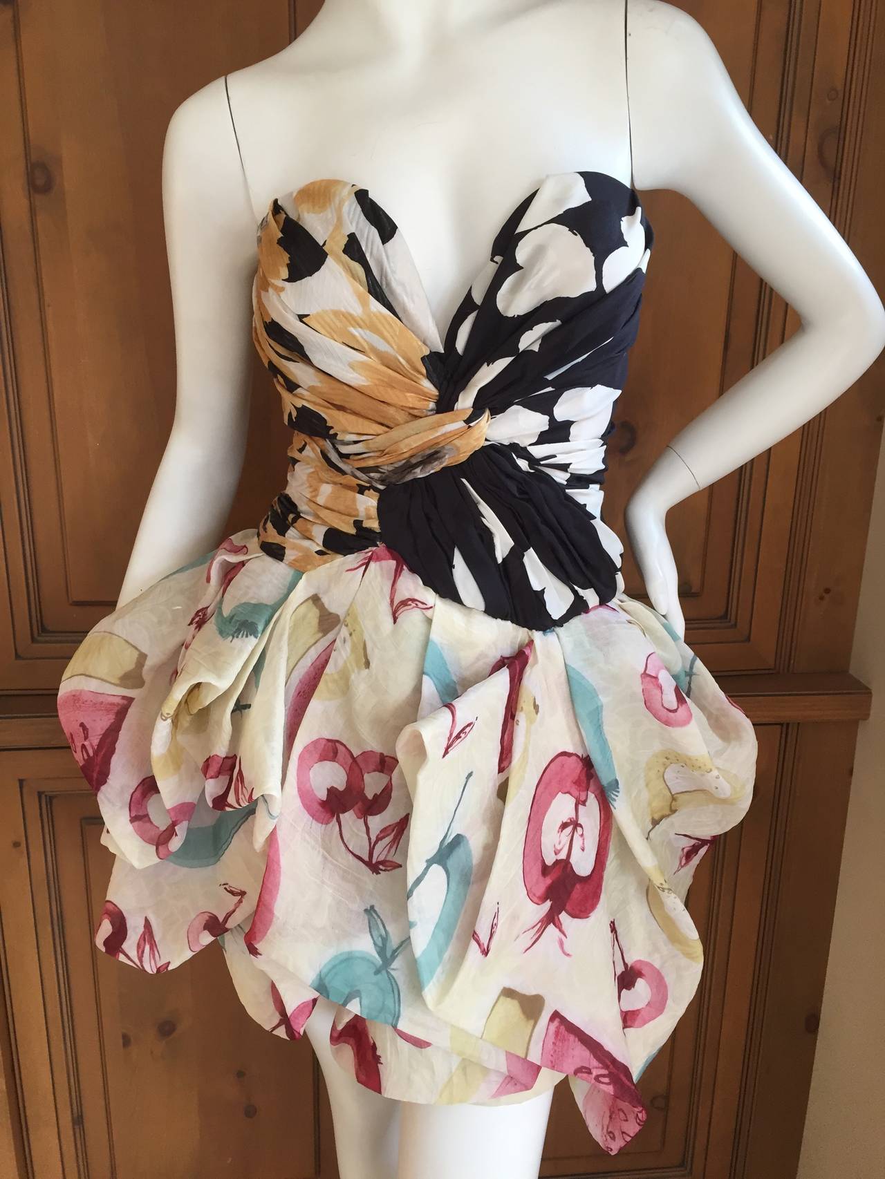 MOSCHINO Vintage Silk Party Dress with Built in Corset
This is so beautiful, the photos don't capture its charm
The corset is the entire top, so wonderfully crafted
I believe this to be an early 80's Moschino, there is a lot of hand work,  a
