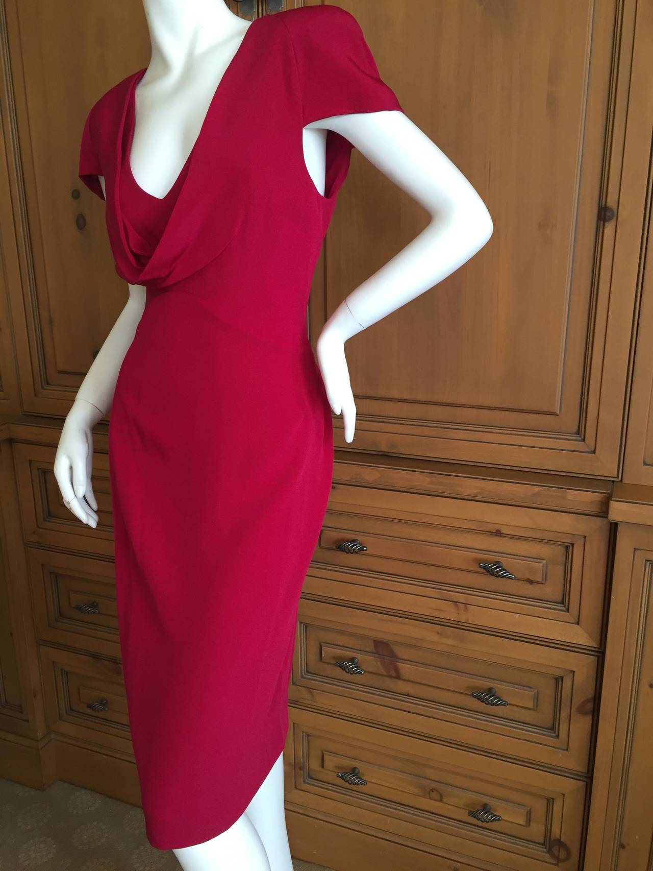 Lovely scoop neck silk dress in rasberry from Alexander McQueen.
New with tags
sz 46