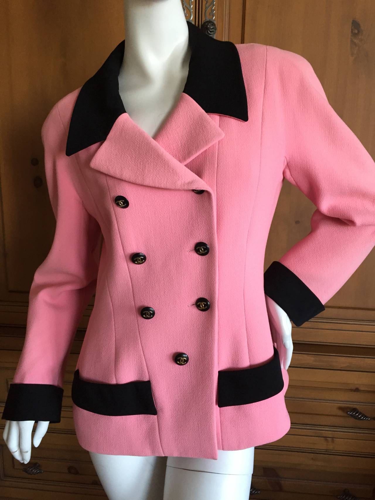 Chanel Iconic Pink Boucle Jacket with Black Trim.
Reminiscent of the pink and black boucle suit Jackie Kennedy wore in Dallas, 1963.