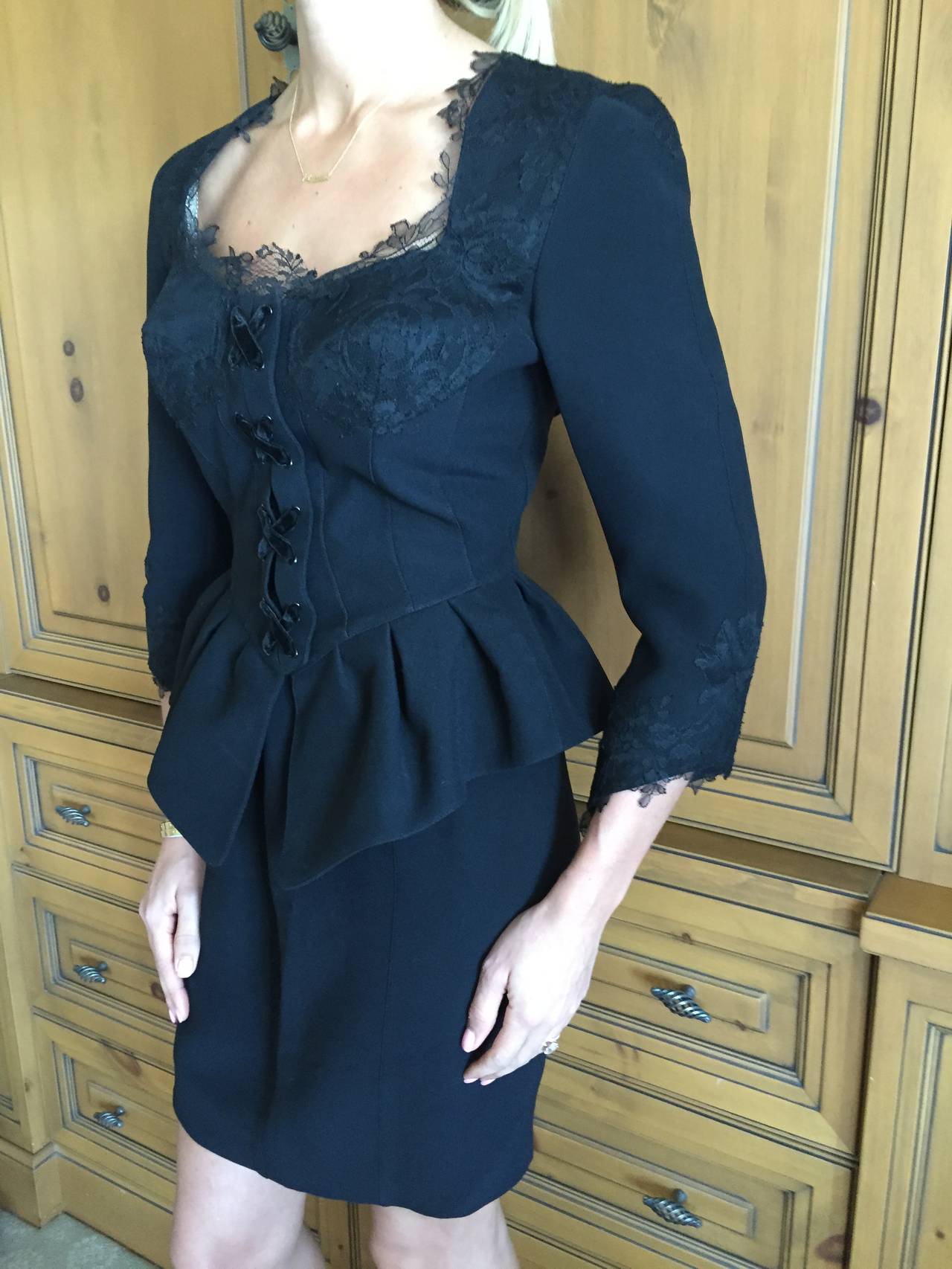 Thierry Mugler Black Corset Lace Peplum Suit.
This is so sweet. Black wool with contrasting black velvet and lace details.
So much prettier in person, black is hard to photograph in detail.