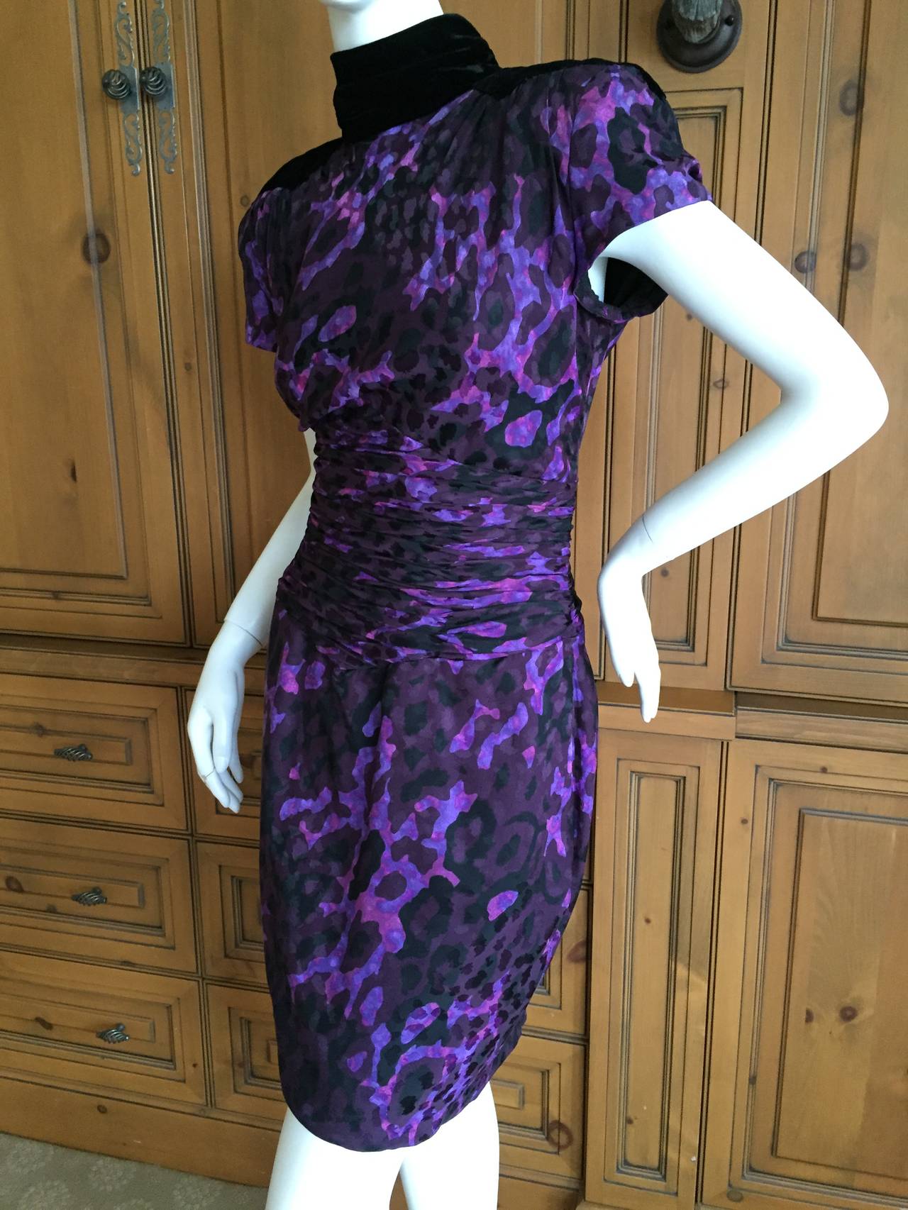 Vintage YSL Rive Guache Silk Leopard Print Shirred Dress with Velvet Accents
This is just exquisite the photos don't quite capture its charms

BUST:	38 in. 
WAIST:	28 in. 
HIP:	38 in. 
LENGTH:	53 in.