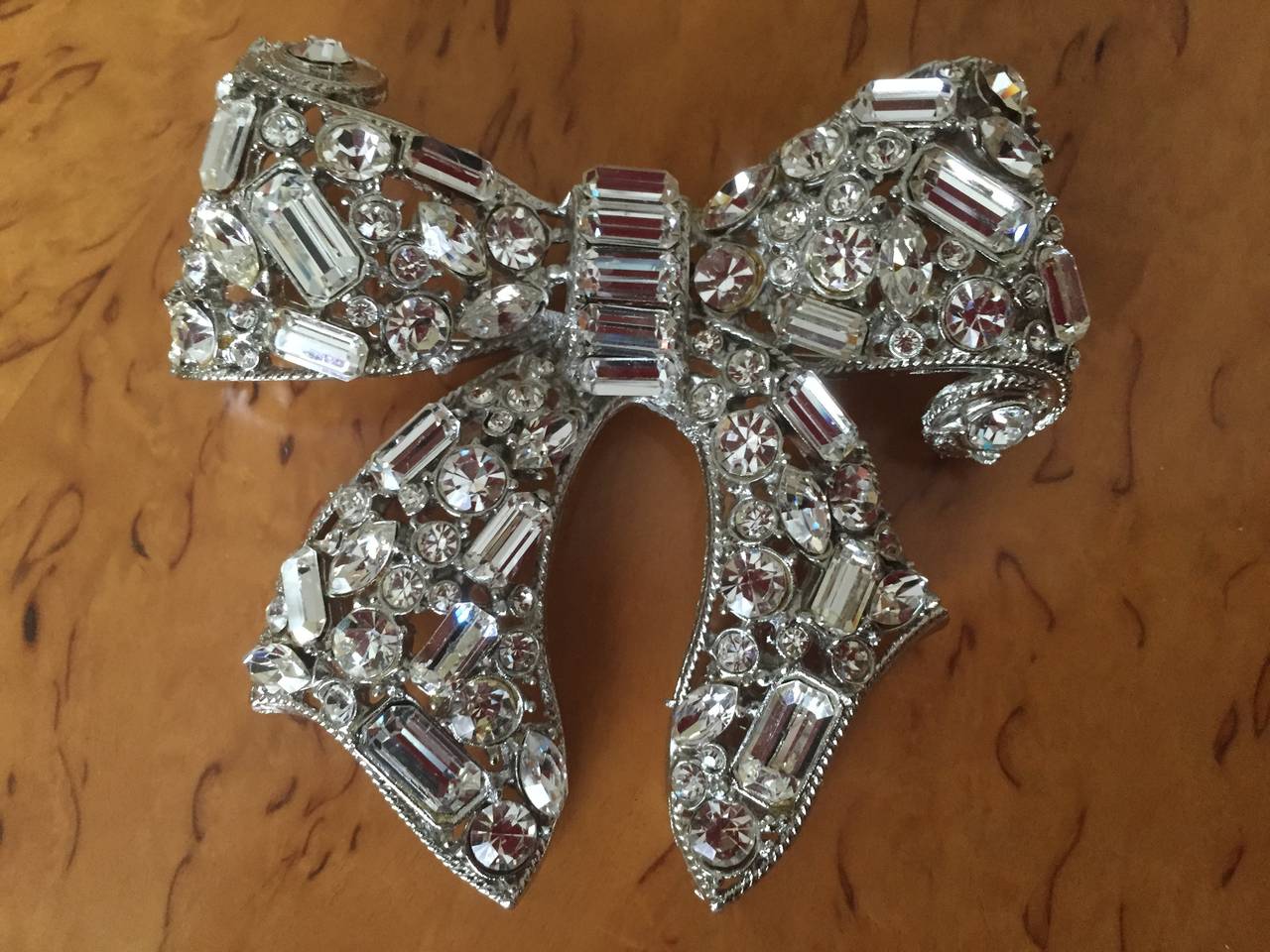 Giant Swarovski crystal bow pin circa 1985
This was a runway piece , Bill Blass featured it at the bottom of the back, a stunning place to wear a large bow.