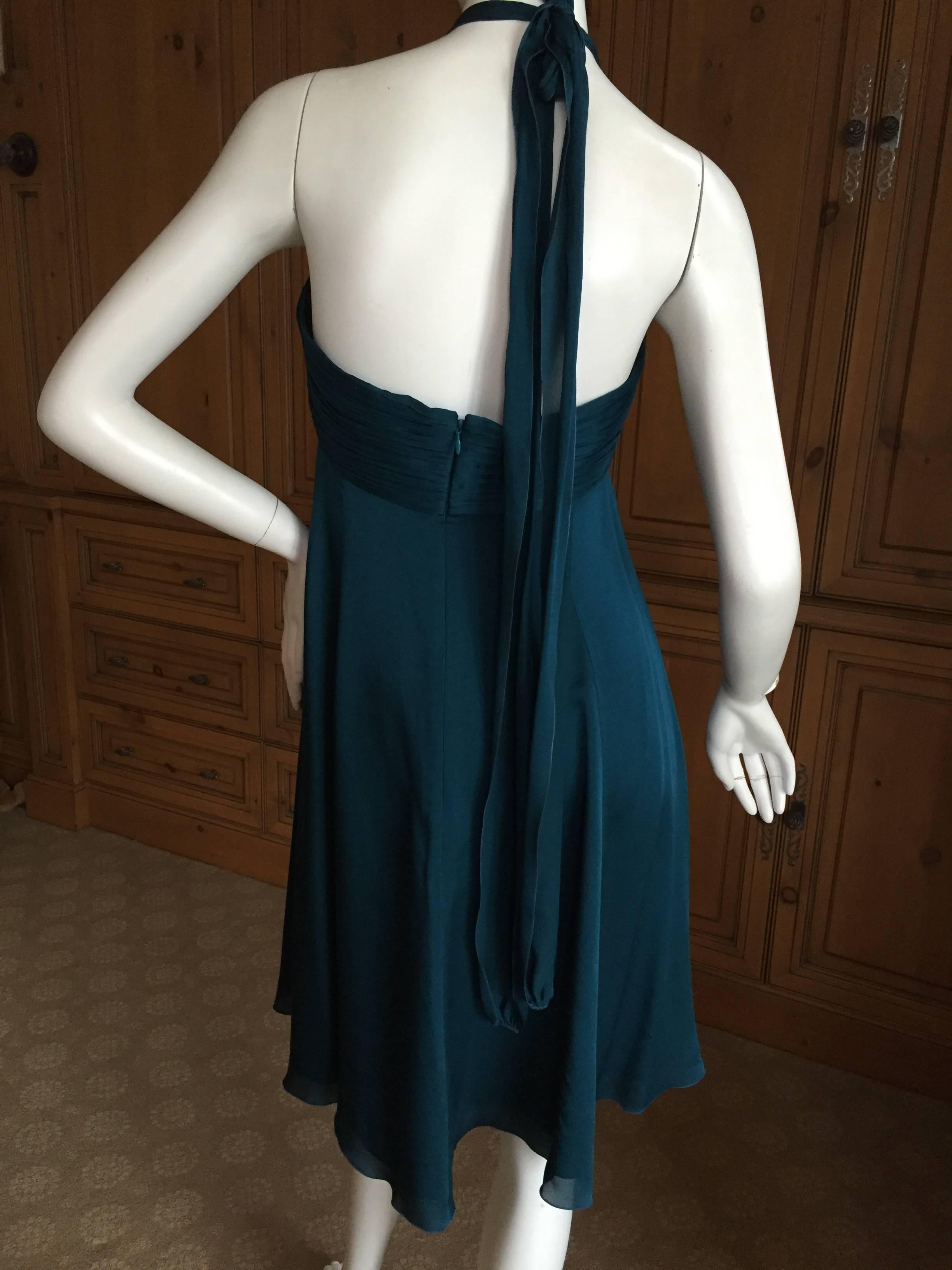 Andrew Gn Paris Silk Dress w Turquoise & Malachite Jeweled Bust.
This is such a pretty dress, empire style with genuine turquoise and malachite embellishments.
Size 38
Bust 36