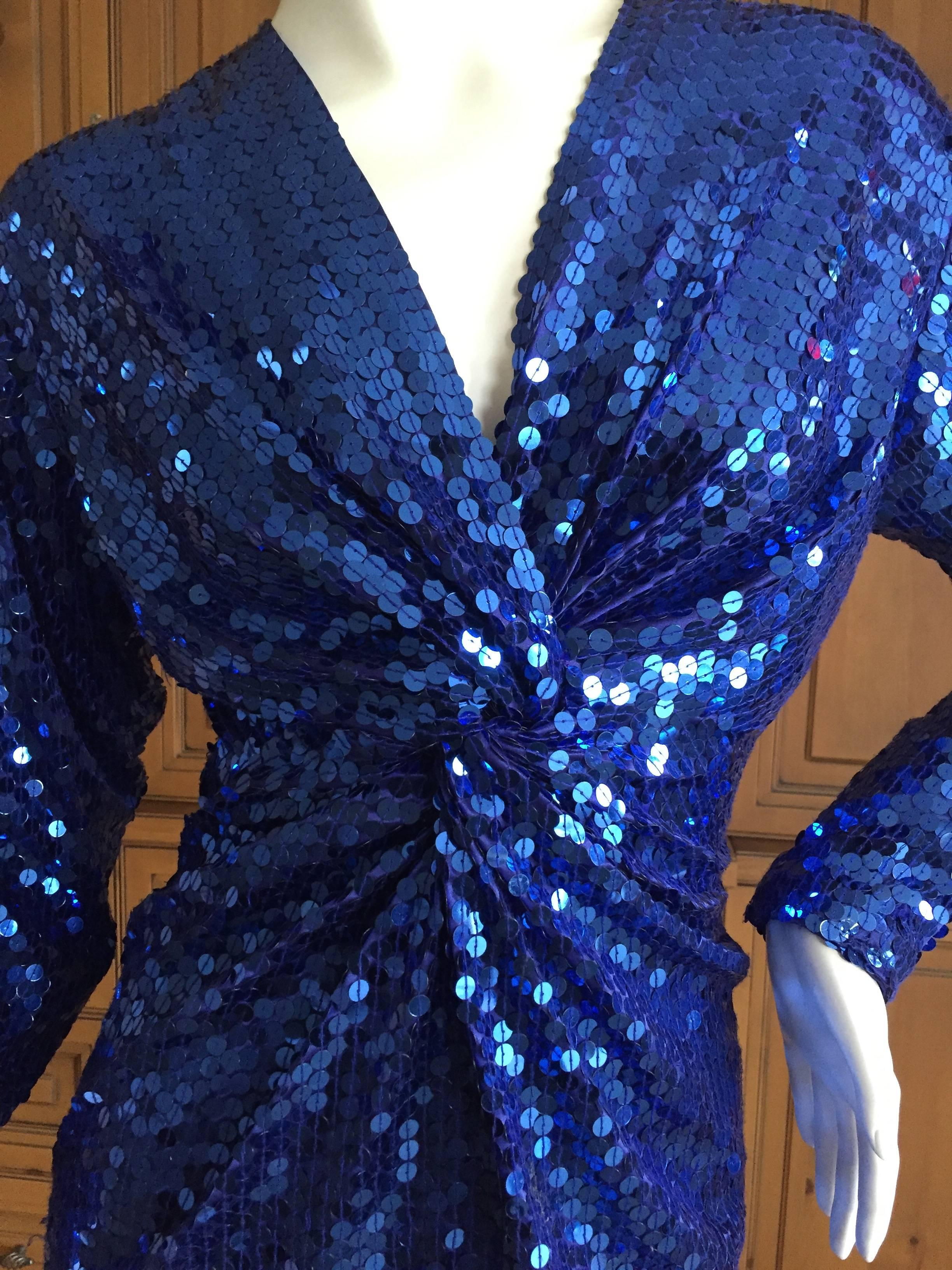 Oleg Cassini 1970's Sequin Disco Era Dress.
This is such a classic example of disco dressing, with a knot at the bust.
Vintage size 4
Bust 38"
Waist 30"
Hips 40"
Length 58"
Excellent condition