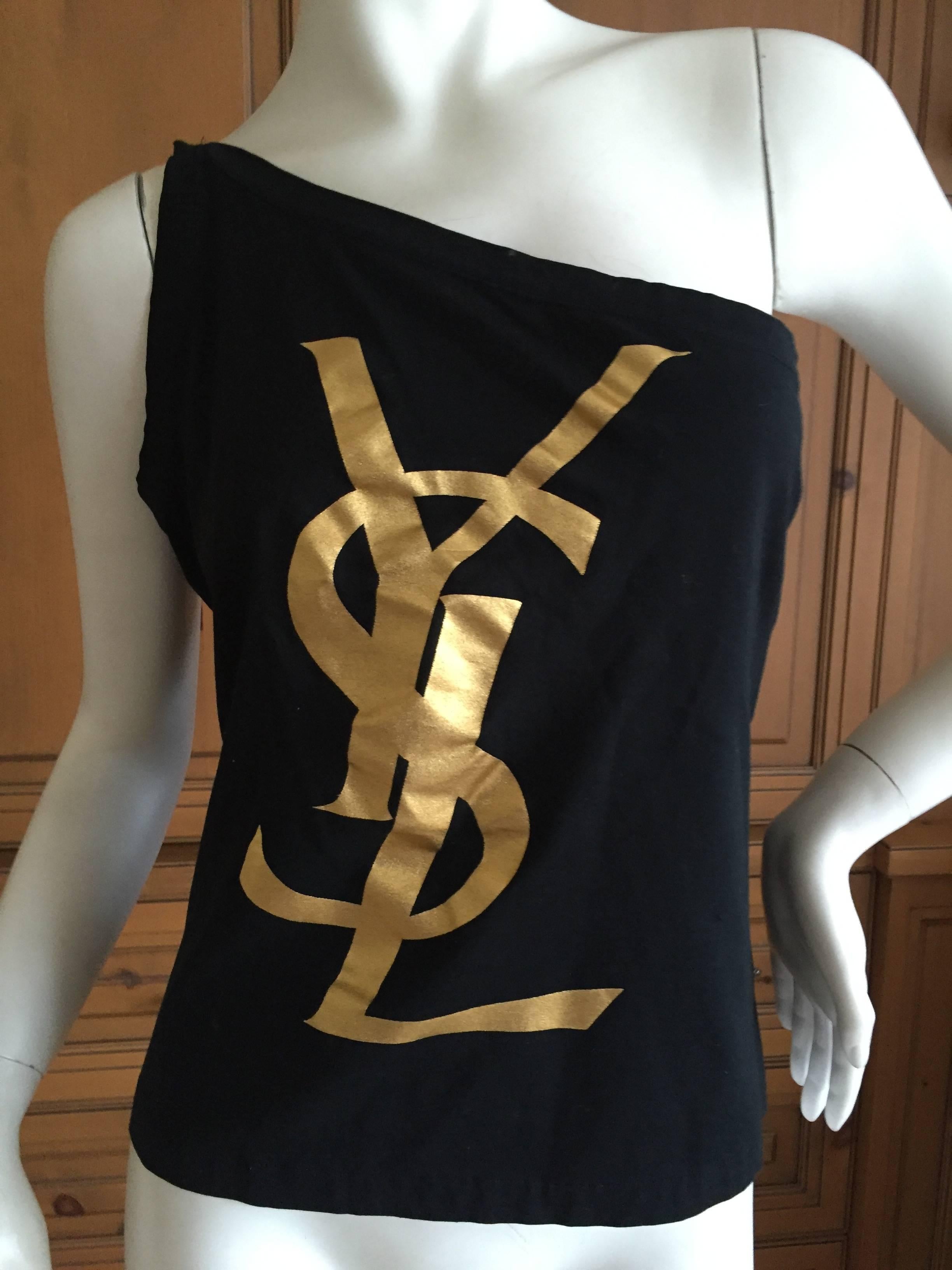 Wonderful vintage one shoulder top featuring the Cassandre designed YSL logo in gold.