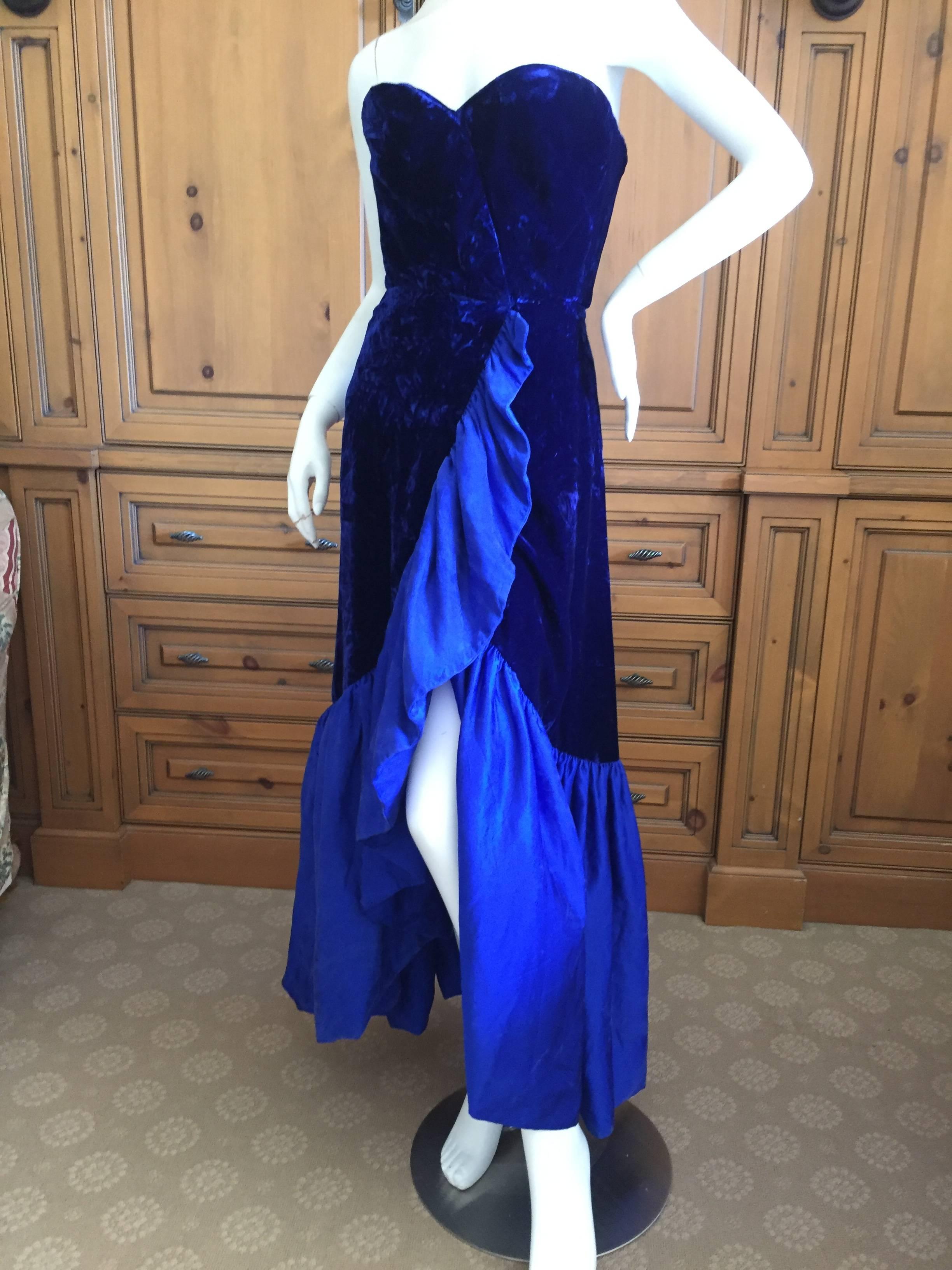 Exquisite saphire blue velvet evening gown from Arnold Scaasi form Bergdorf Goodman circa 1980.
This is much prettier in person, the photo's don't do it justice.
It was custom made and is quite tiny, size 0-2?
Bust 34