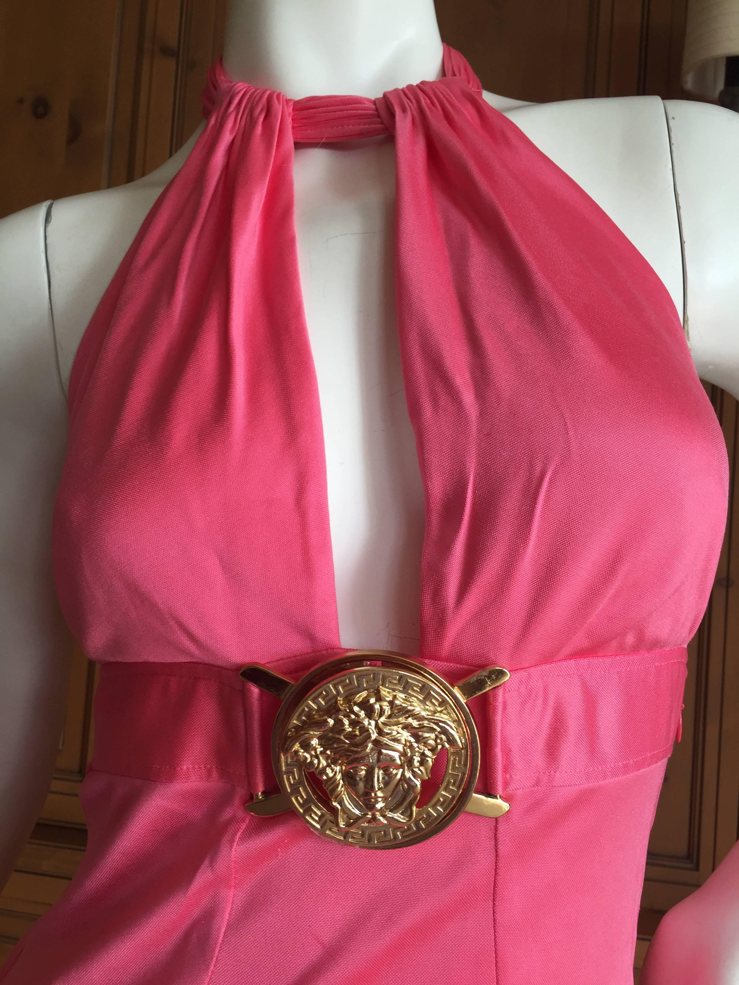 Versace Sexy Backless Halter Dress with Giant Medusa Head Buckle

 Size 38

Such a great vintage Versace.

Bust 34
