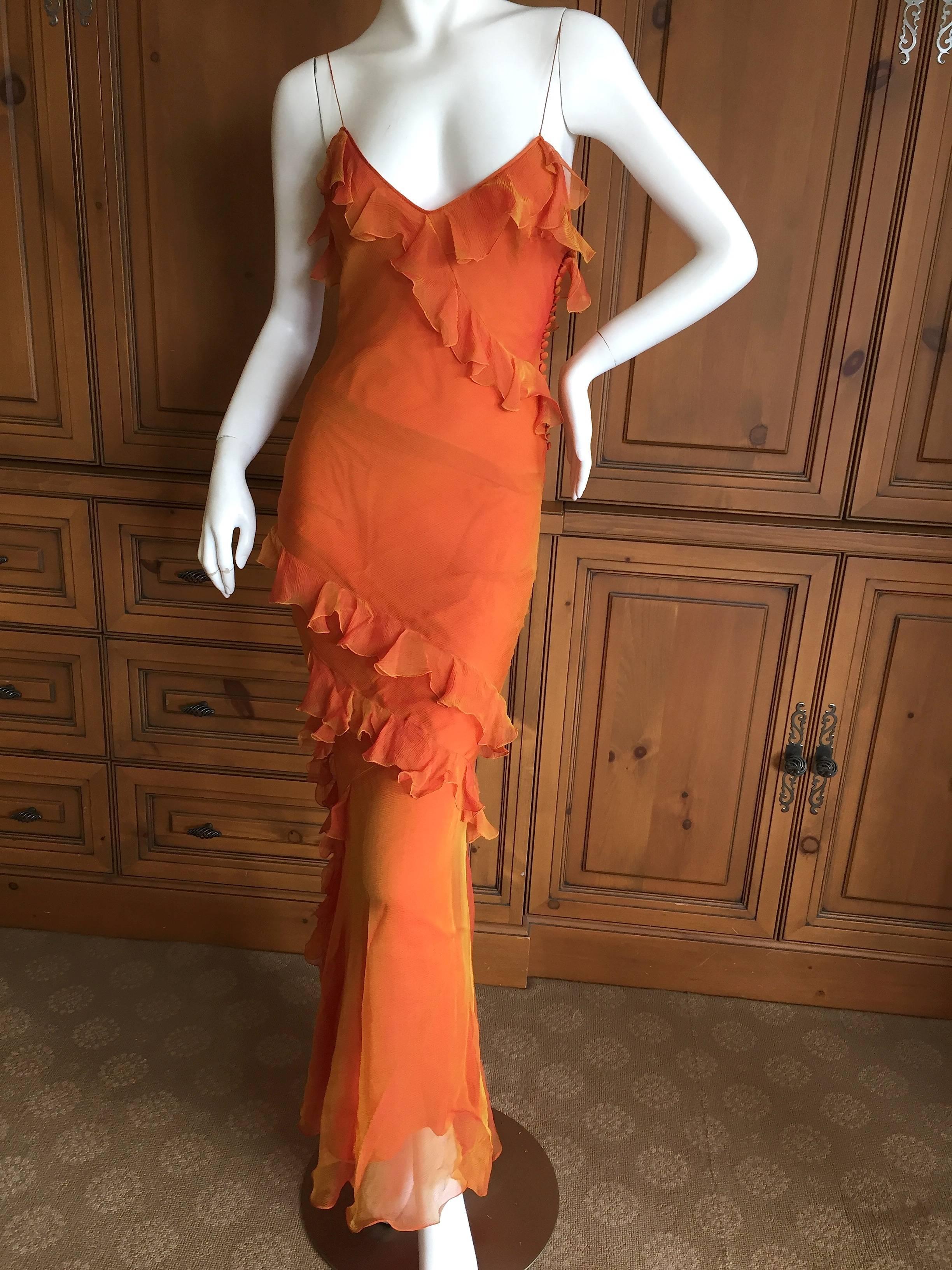 Christian Dior by John Galliano Bias Cut Orange Ruffled Dress.
This is so pretty, trailing ruffles of silk chiffon.
 Size 8 

Bust 36