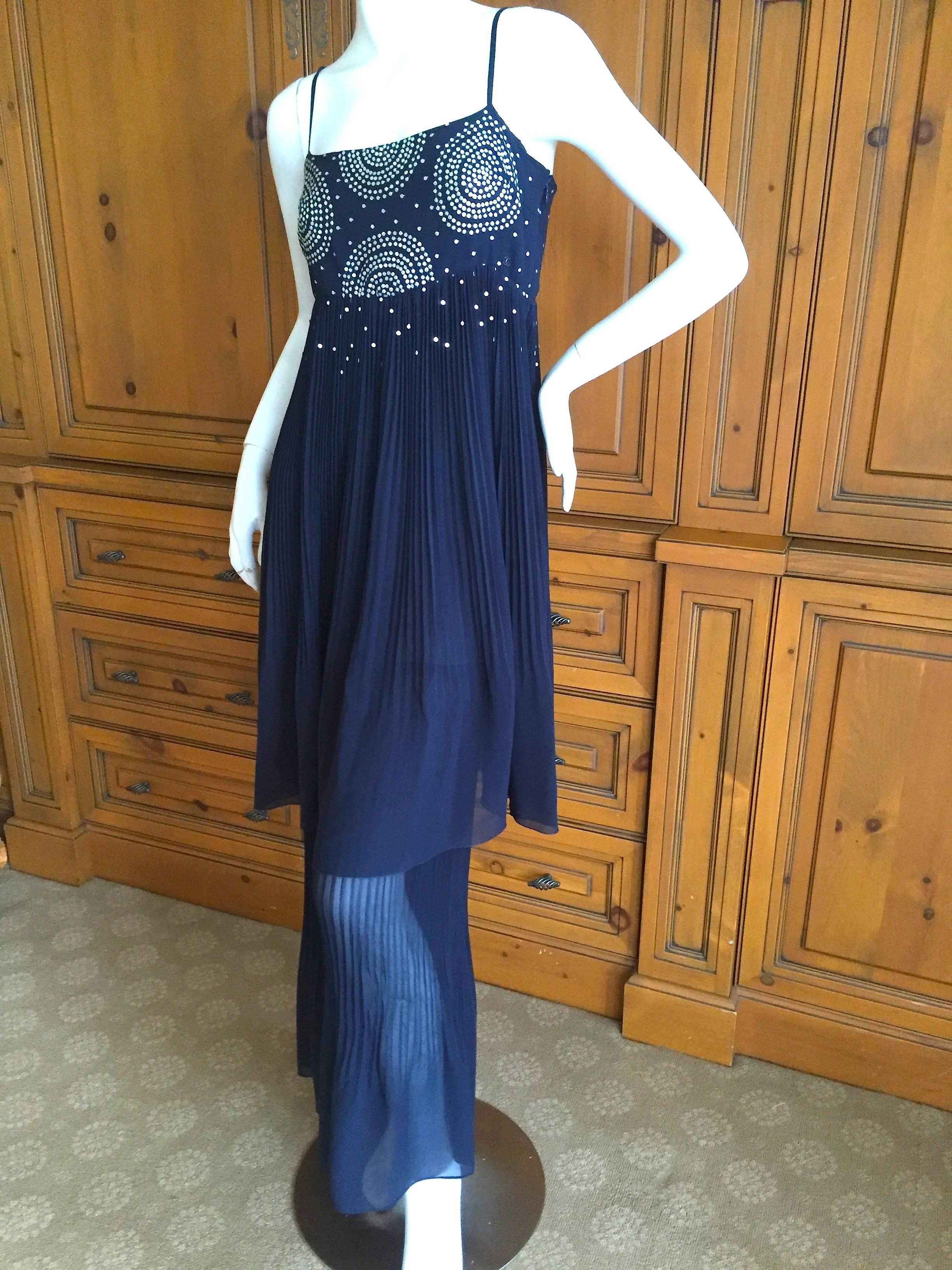 Wonderful navy blue dress from Chanel.
This has attached pleated palazzo pant's, but I styled it showing them removed, to give you an idea of options.
From Fall 2000 by Karl Lagerfeld for Chanel.
Size 38
Bust 36