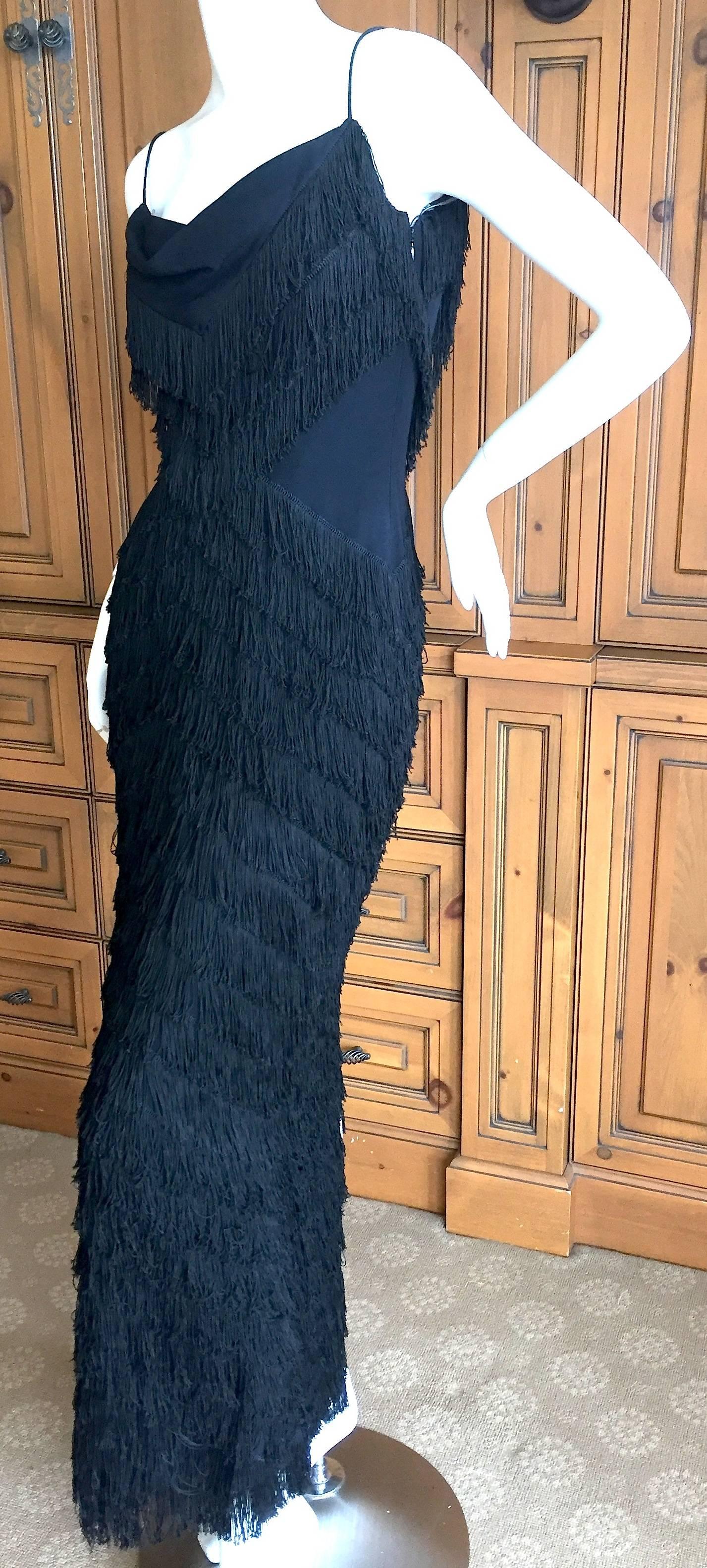 Terrific fringed dress in a chevron pattern by John Galliano for Christian Dior.
The photos don't do it  justice, this is sensational when in motion.
Size 36
Bust 36