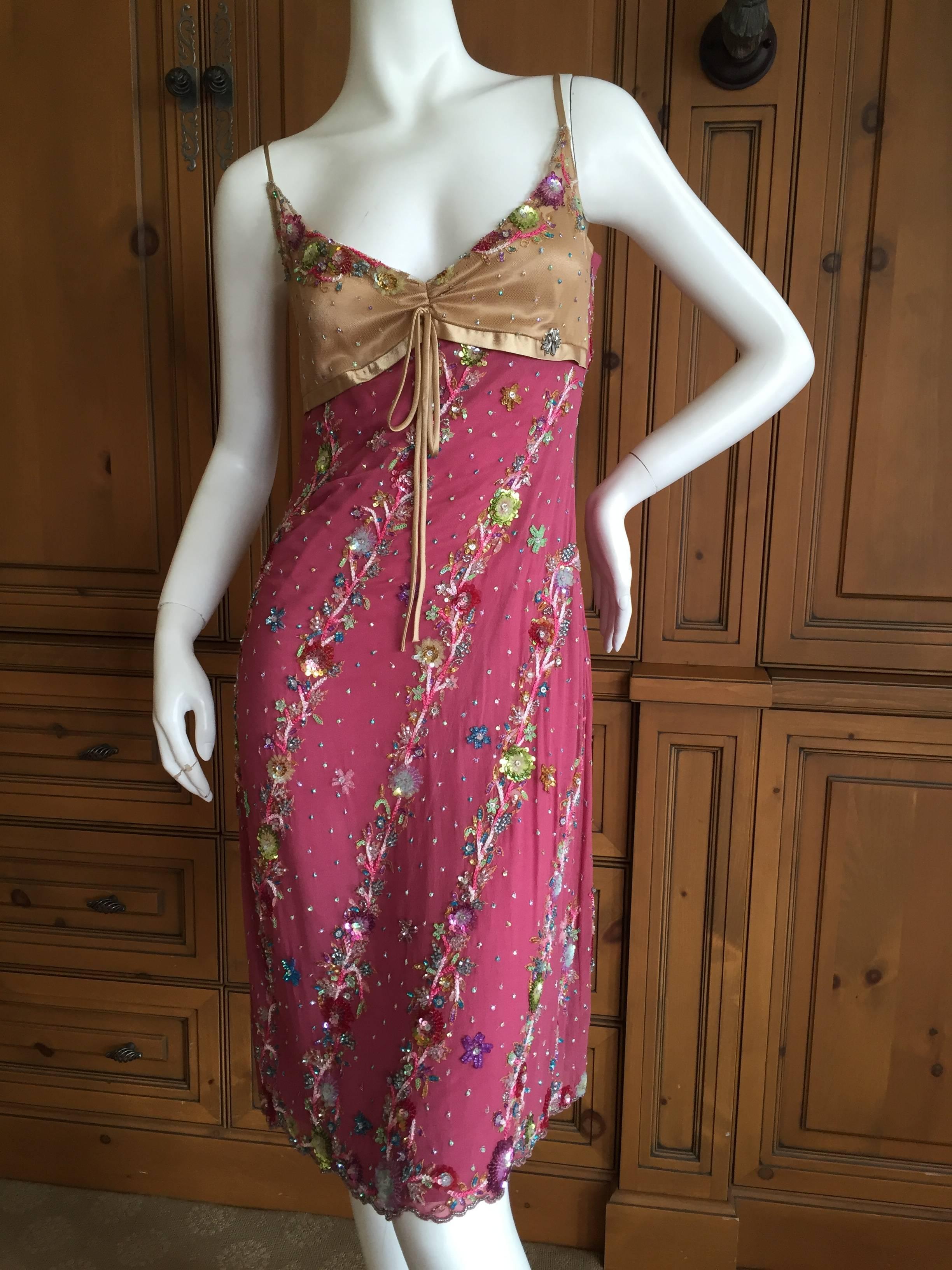 John Galliano Enchanting Mini Dress with Floral Sequin Details.
This is so sweet , please use the zoom feature to see all the great details.
NWT, unworn
Size 40

Bust 36