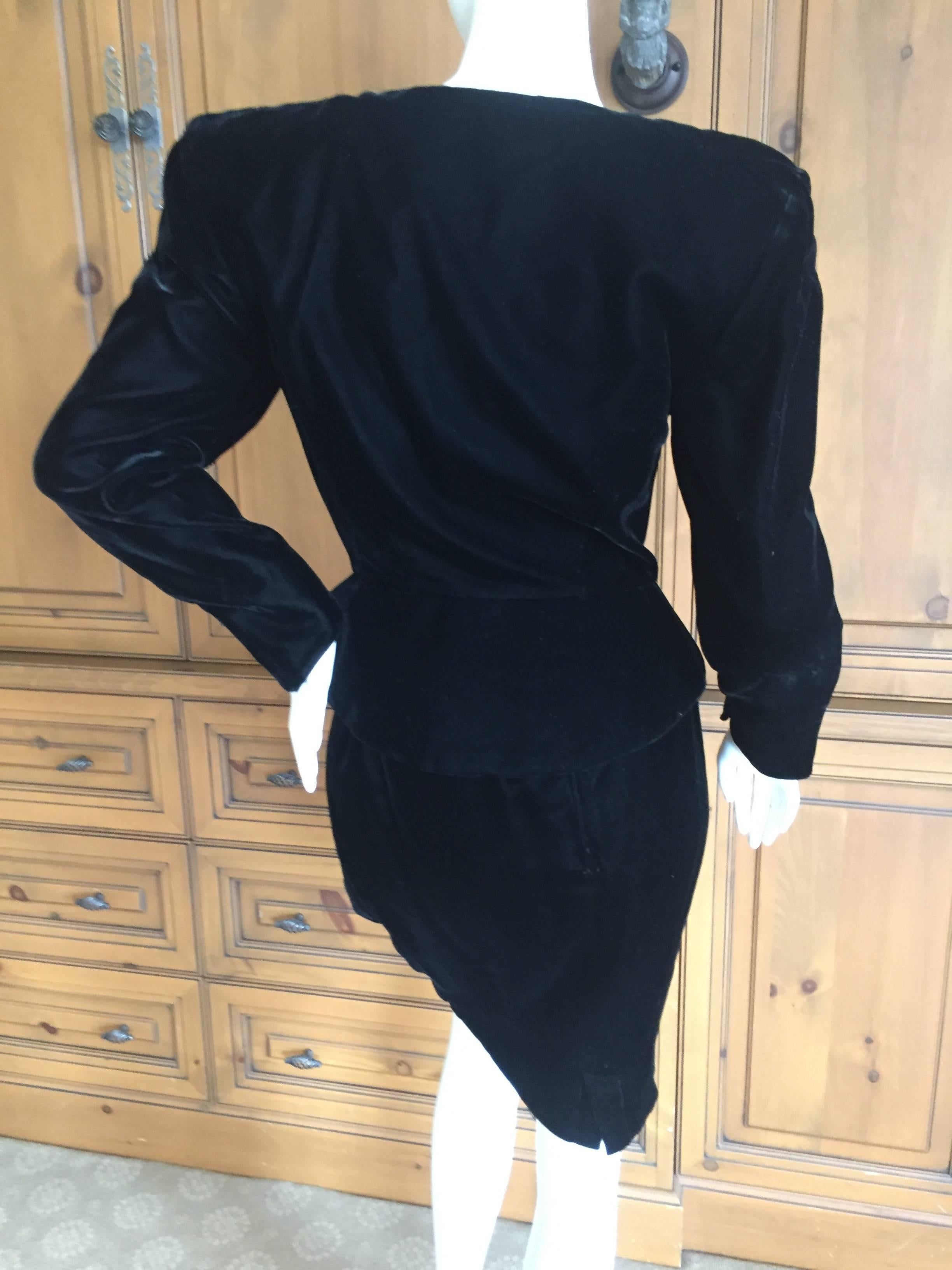 Beautiful black velvet skirt suit with a sweet portrait neckline from Thierry Mugler, circa 1988.
Size 40
Bust 38